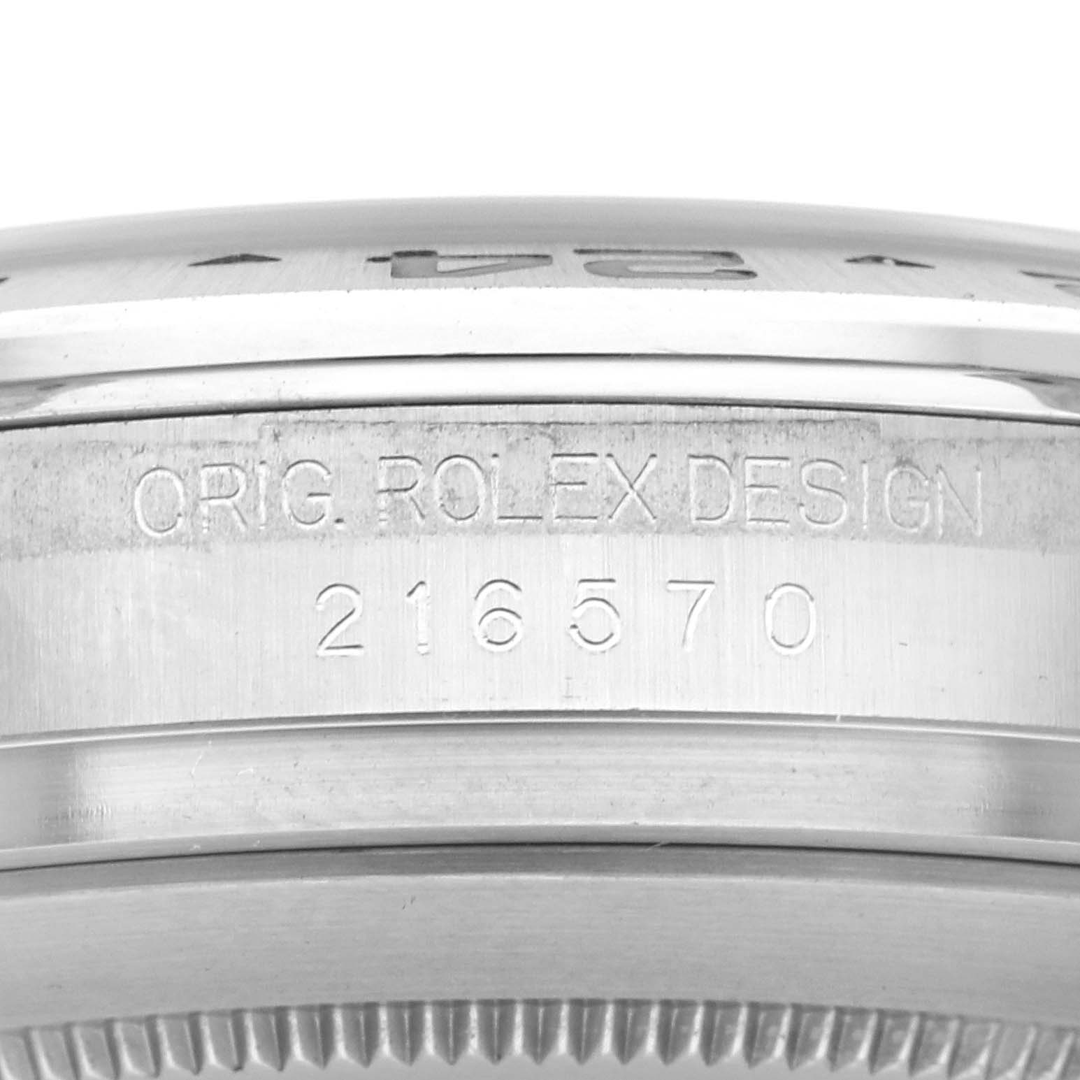 The image shows the side view of the Rolex Explorer 216570 Men
s Stainless Steel Black Dial 216570 Men
s Stainless Steel Black Dial watch case, highlighting the engraving with the model number 216570.