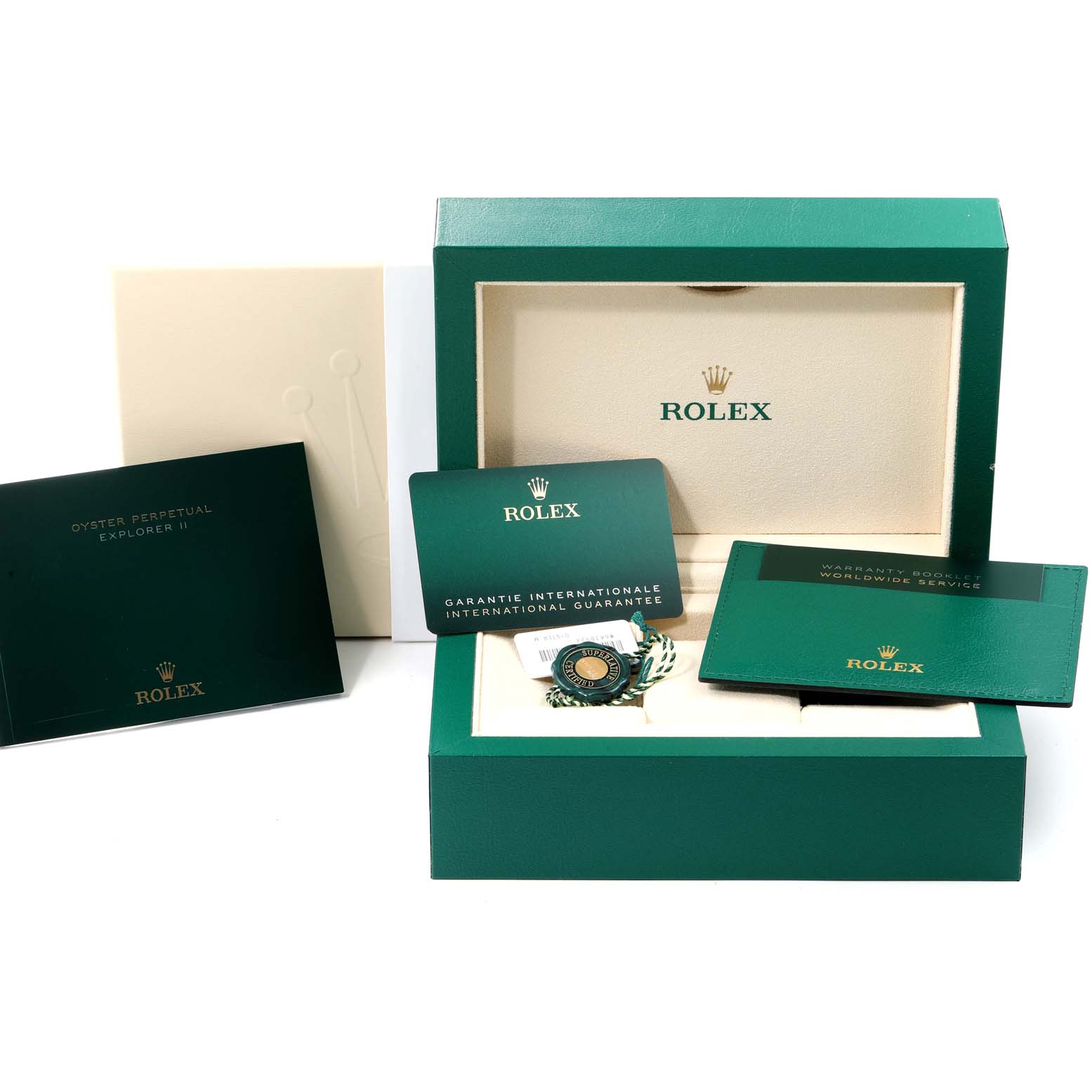 The image shows packaging, booklets, and accessories of a Rolex Explorer 226570 Men's Stainless Steel Black Dial 226570 Men's Stainless Steel Black Dial watch laid out from a front angle.