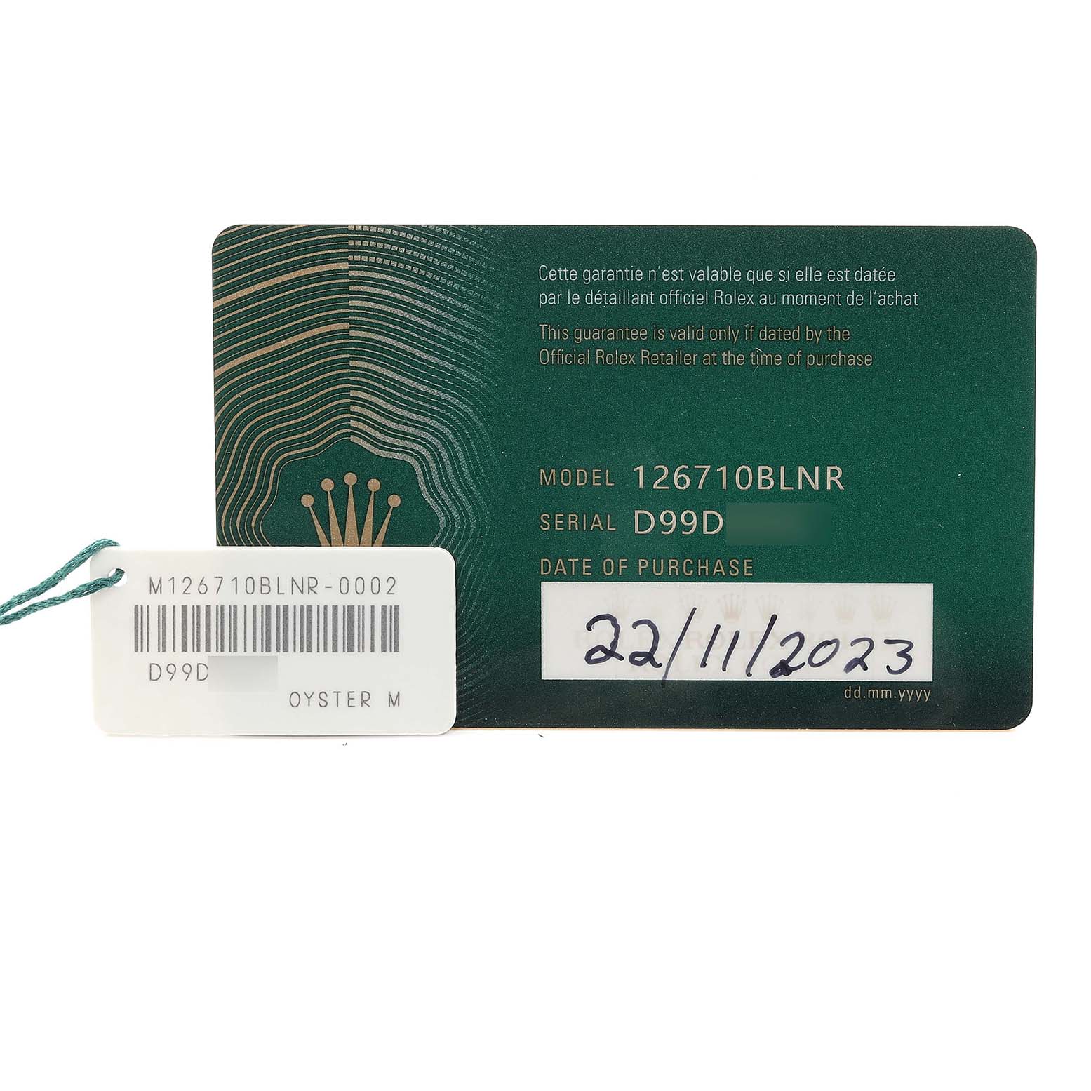 The image shows a warranty card and tag for the Rolex GMT-Master 126710 Men
s Stainless Steel Black Dial 126710 Men
s Stainless Steel Black Dial model 126710BLNR.