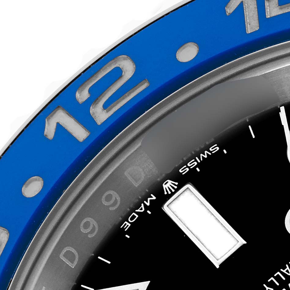 The image shows a close-up of the blue bezel and part of the dial of the Rolex GMT-Master 126710 Men
s Stainless Steel Black Dial 126710 Men
s Stainless Steel Black Dial watch.