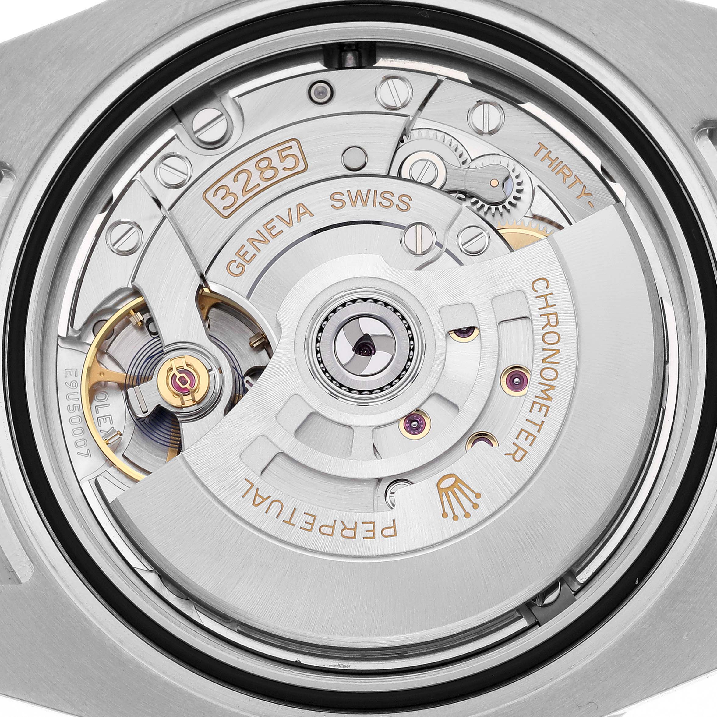 The image shows the Rolex GMT-Master 126720VTNR Men's Stainless Steel Black Dial 126720VTNR Men's Stainless Steel Black Dial's movement, focusing on its intricate mechanical details from the back.