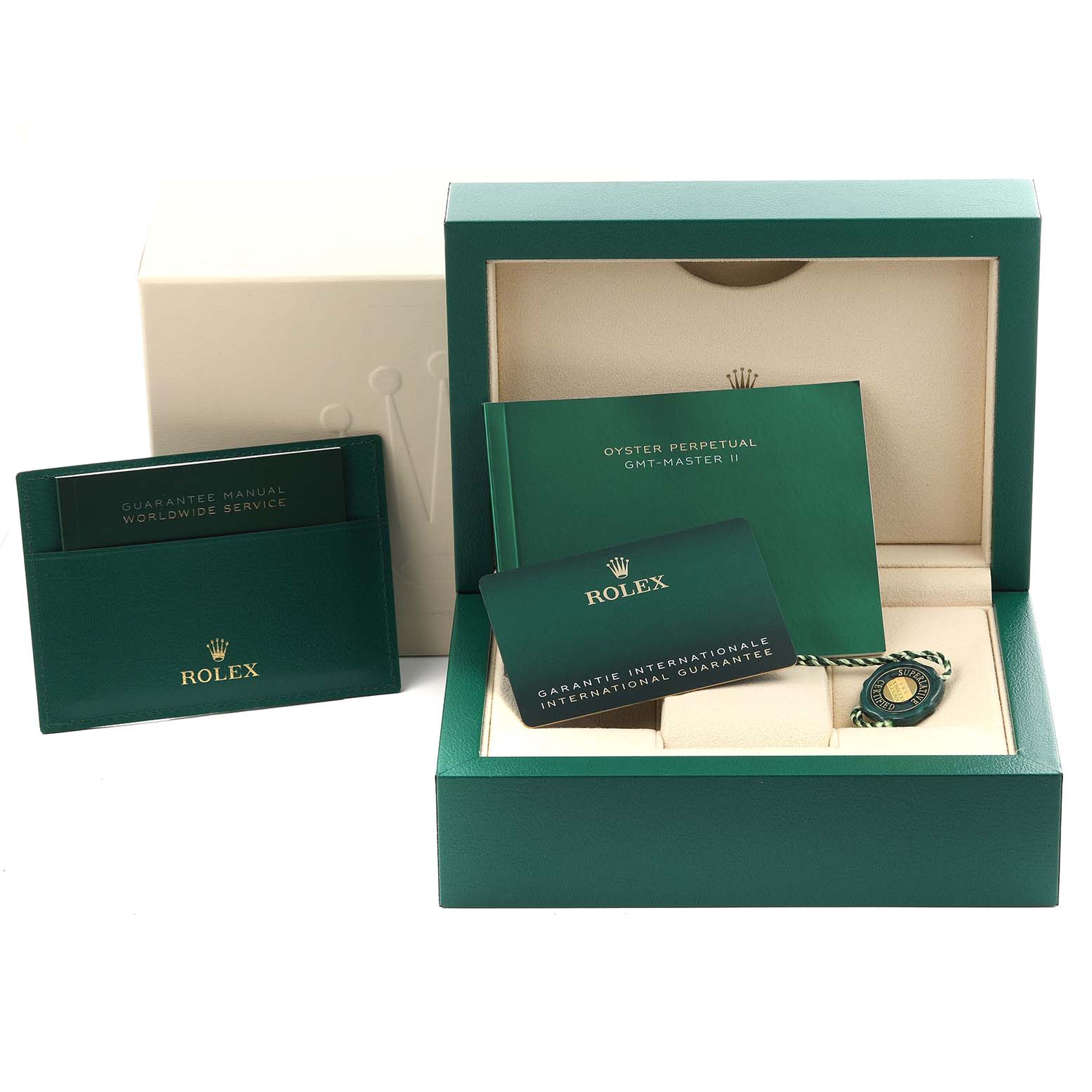 The image shows the packaging and documents for a Rolex GMT-Master 126720VTNR Men's Stainless Steel Black Dial 126720VTNR Men's Stainless Steel Black Dial, including manuals and warranty cards.