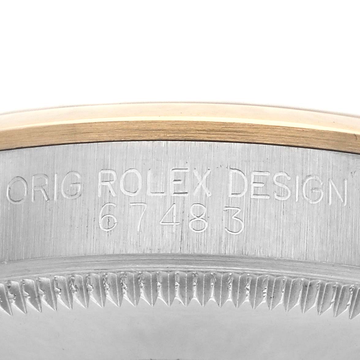 The image shows the engraved side of a Mid-Size Rolex watch case, displaying the model number.