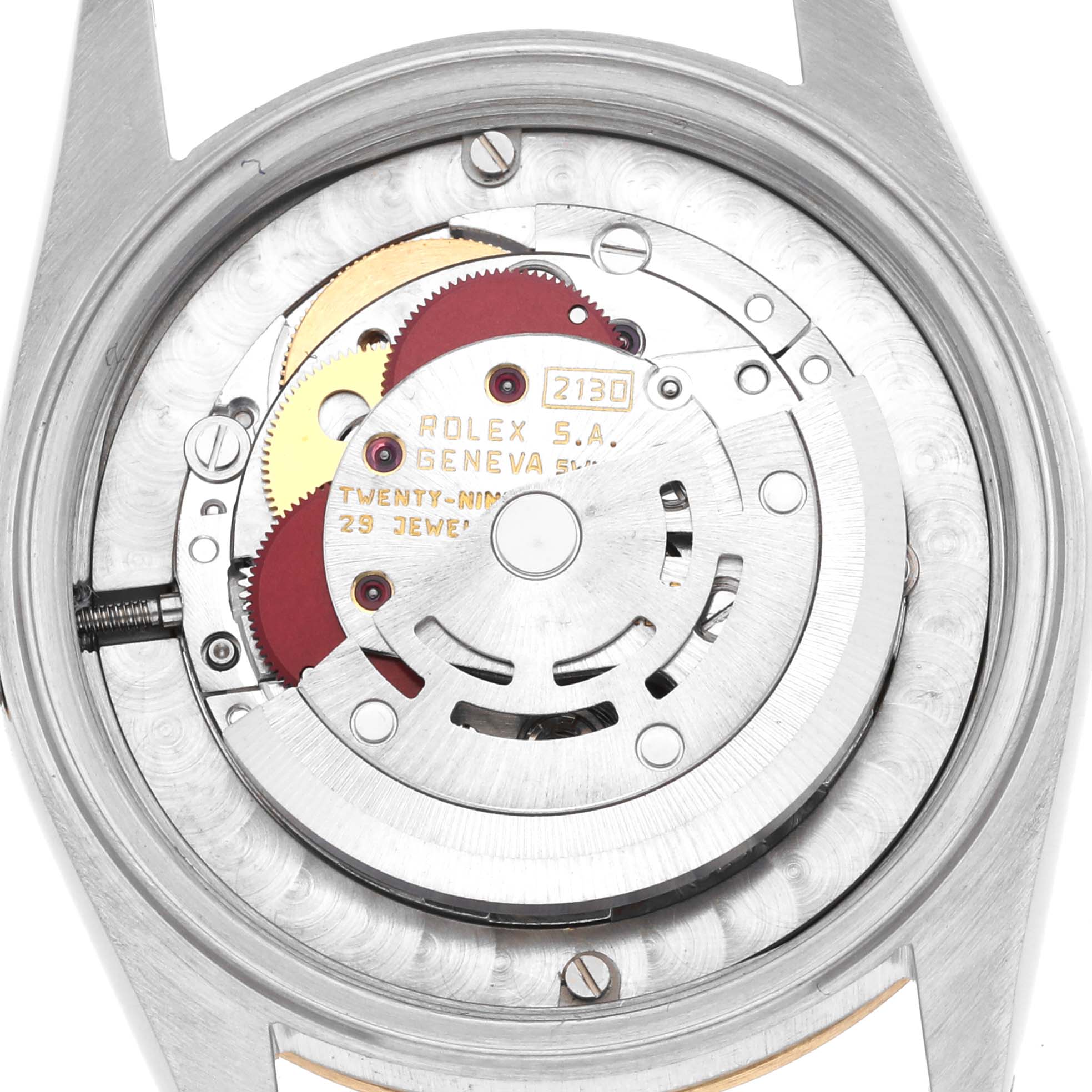 The image shows the movement mechanism of a Rolex Mid-Size 67483 Women's Steel and Gold (two tone) White Dial 67483 Women's Steel and Gold (two tone) White Dial watch, viewed from the back.