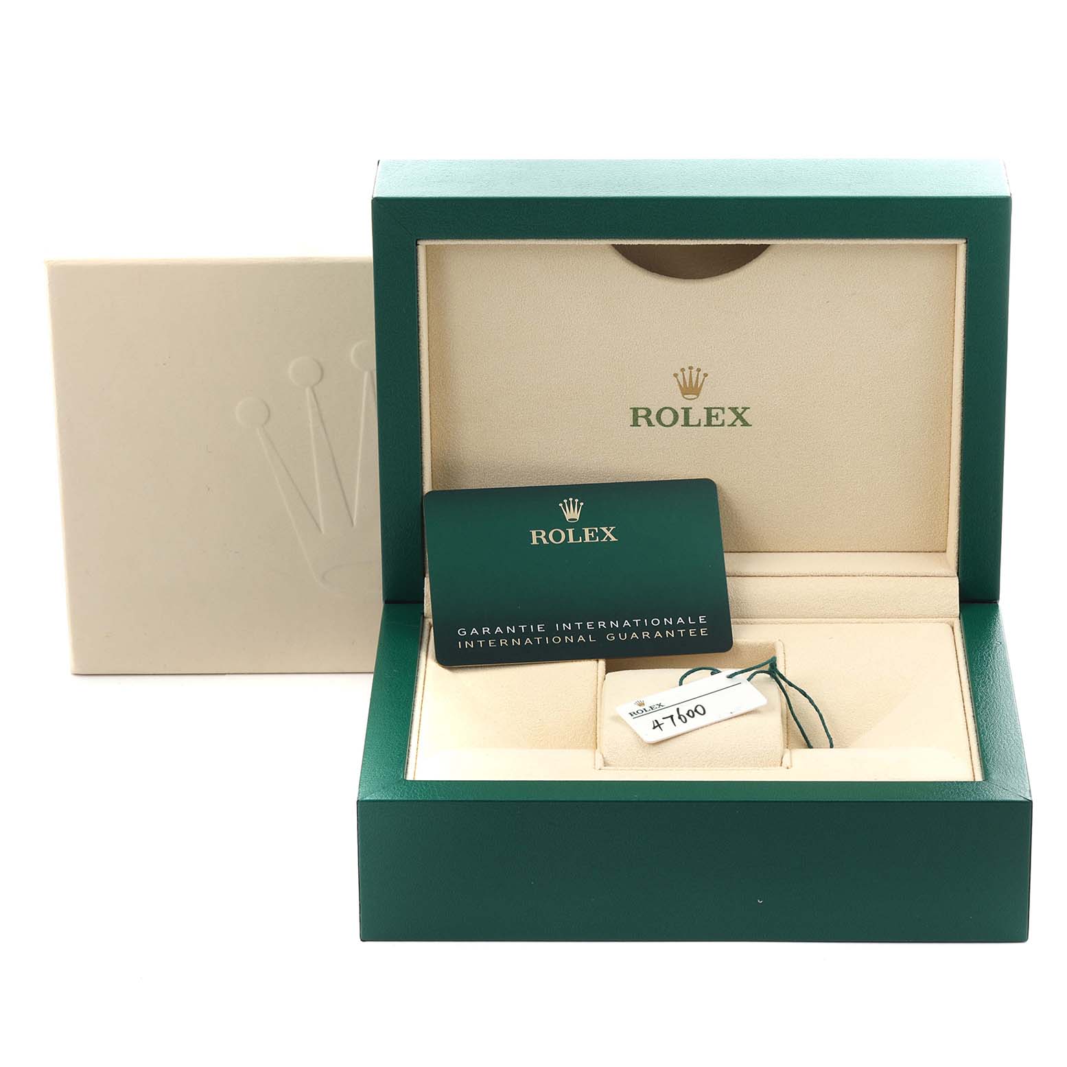 The image shows an open Rolex Oyster Perpetual 124300 Men's Stainless Steel Blue Dial 124300 Men's Stainless Steel Blue Dial box, warranty card, and a tag with compartments for the watch.