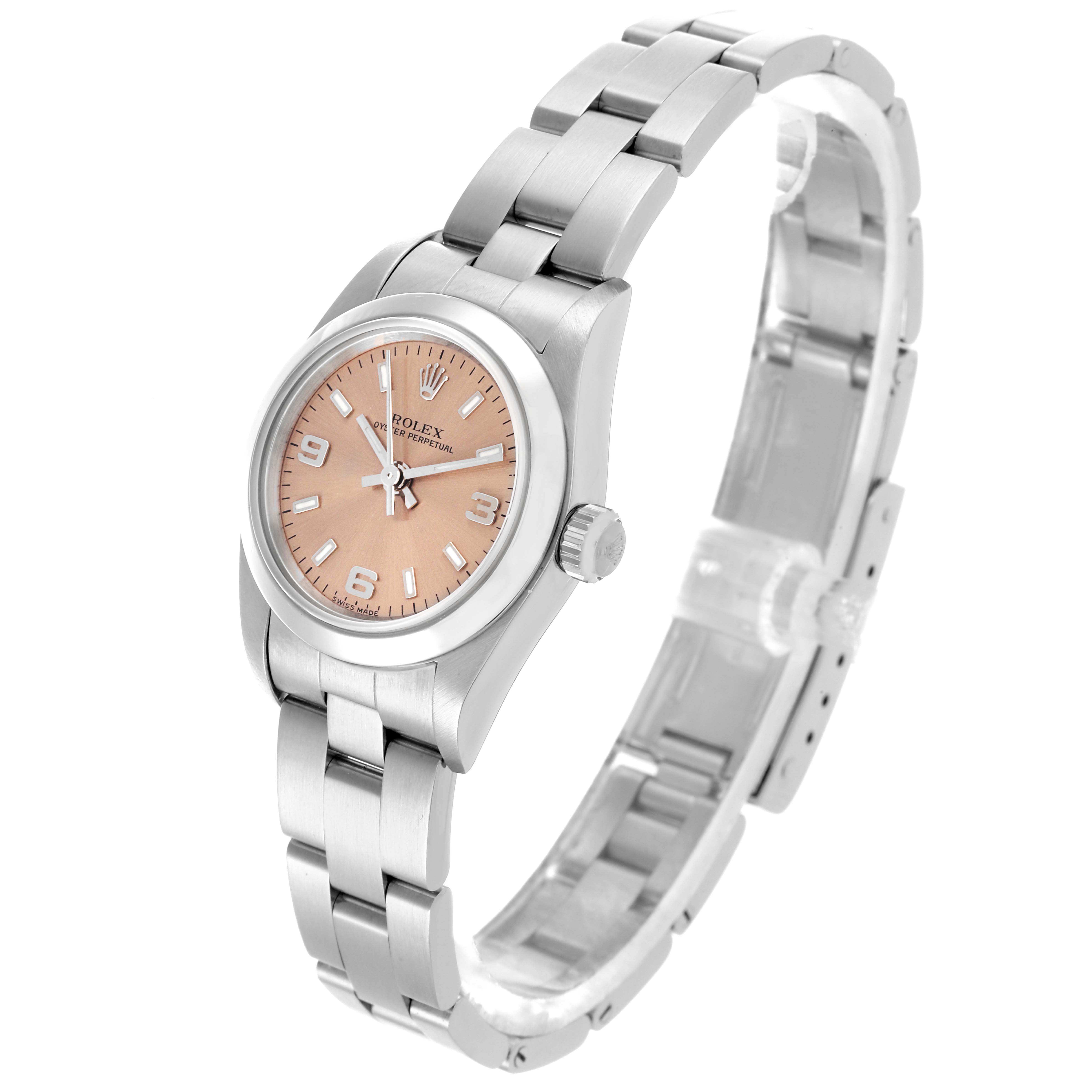 The Rolex Oyster Perpetual 76080 Women's Stainless Steel Pink Dial 76080 Women's Stainless Steel Pink Dial watch is shown at a three-quarter angle, highlighting the dial, case, bracelet, and crown.