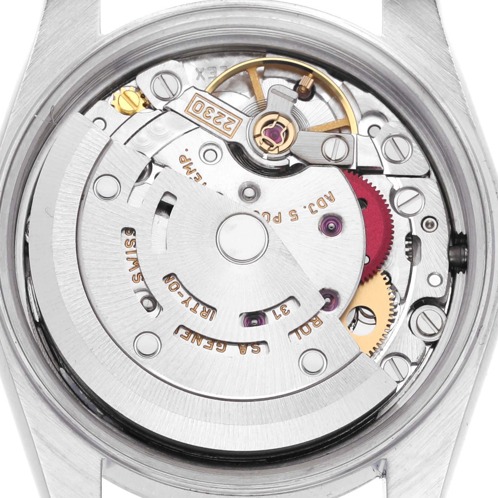 The image shows the internal mechanism of a Rolex Oyster Perpetual 76080 Women's Stainless Steel Pink Dial 76080 Women's Stainless Steel Pink Dial watch from a top-down angle, highlighting gears and components.