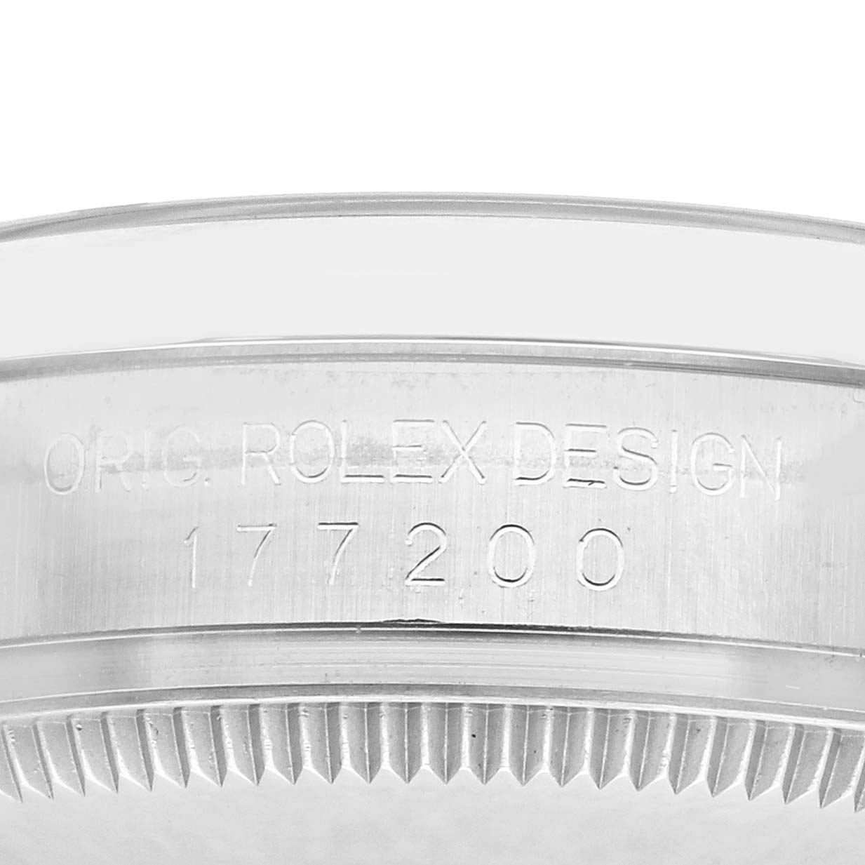 The image shows a close-up of the side of a Rolex Mid-Size 177200 Women's Stainless Steel White Dial 177200 Women's Stainless Steel White Dial watch, displaying the engraved design number.