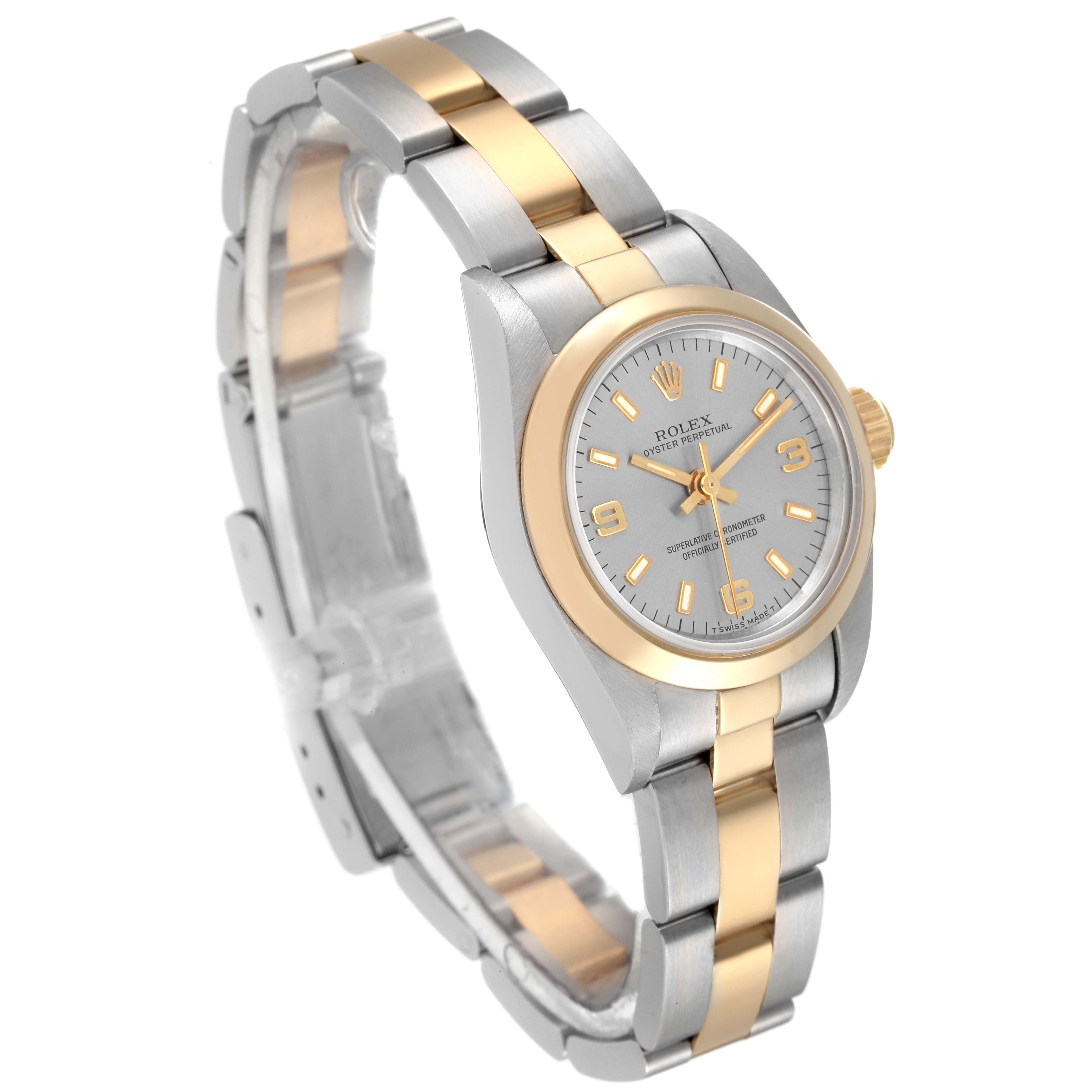 The image shows a Rolex Oyster Perpetual 67183 Women's Steel and Gold (two tone) Grey Dial 67183 Women's Steel and Gold (two tone) Grey Dial watch at a 3/4 angle, highlighting its two-tone metal bracelet and dial.