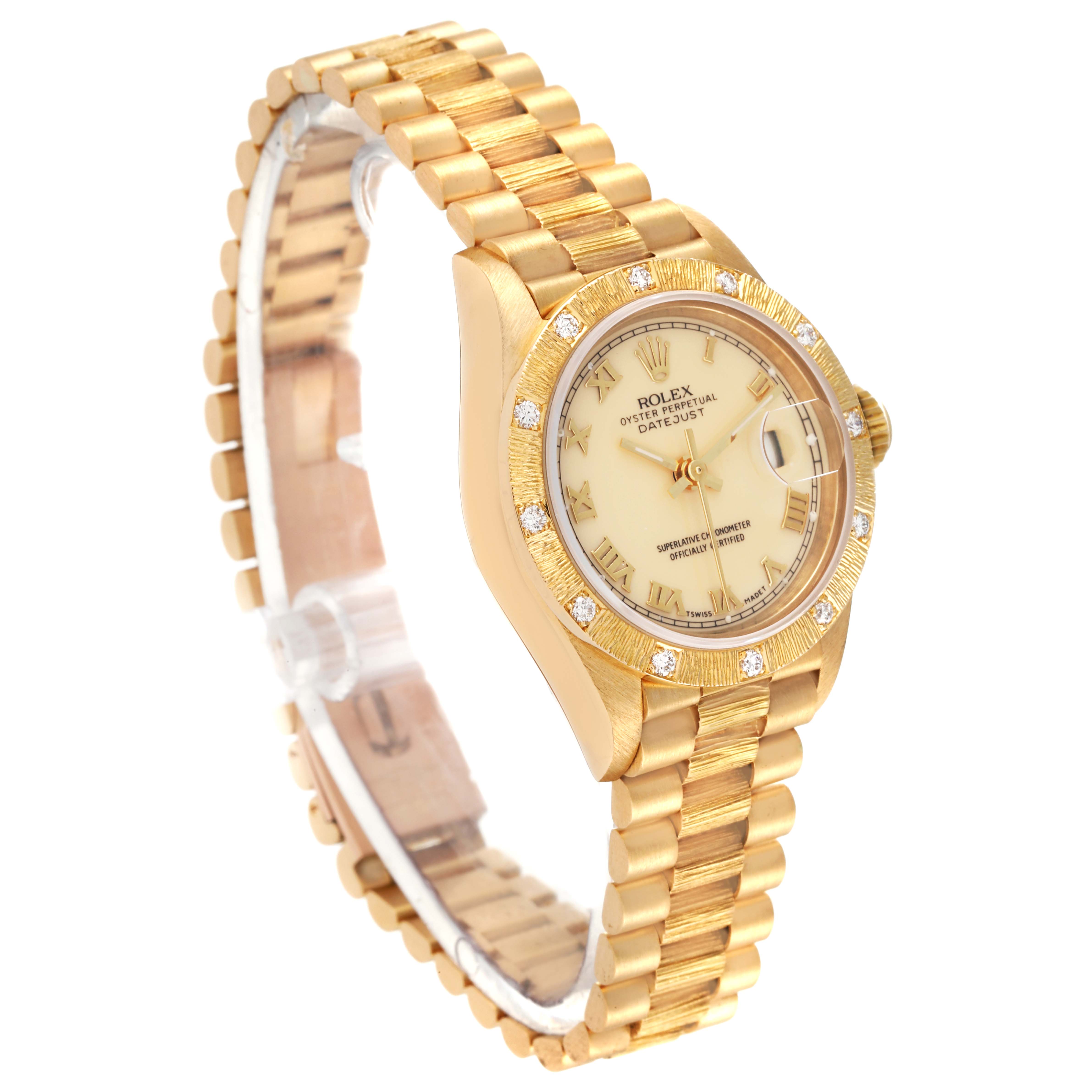 The Rolex President 69288 Women's Yellow Gold Beige Dial 69288 Women's Yellow Gold Beige Dial watch is shown from a slight side angle, displaying the bracelet, dial, crown, and part of the bezel.