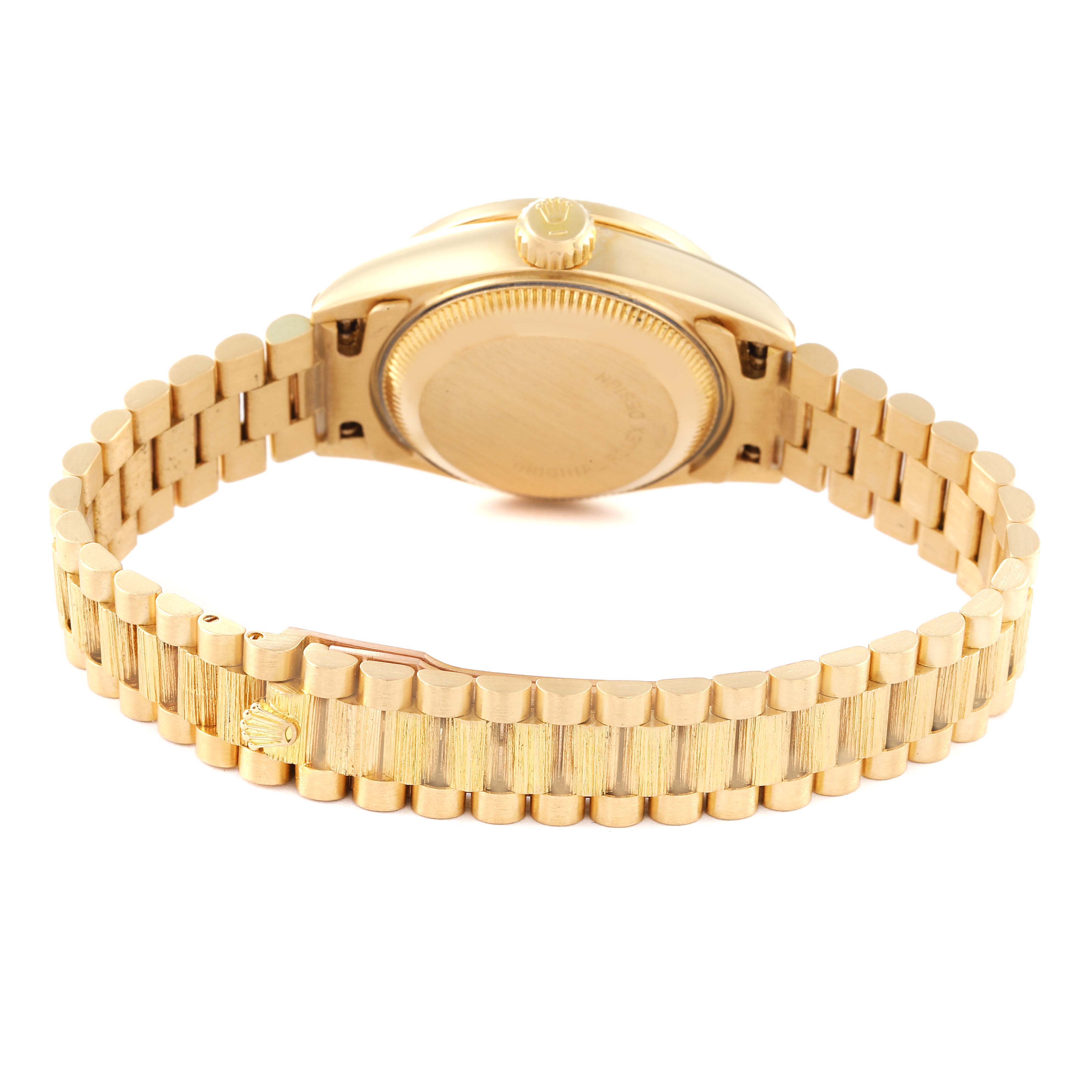 The image shows the back case, crown, and bracelet of a Rolex President 69288 Women's Yellow Gold Beige Dial 69288 Women's Yellow Gold Beige Dial model watch taken from the rear angle.