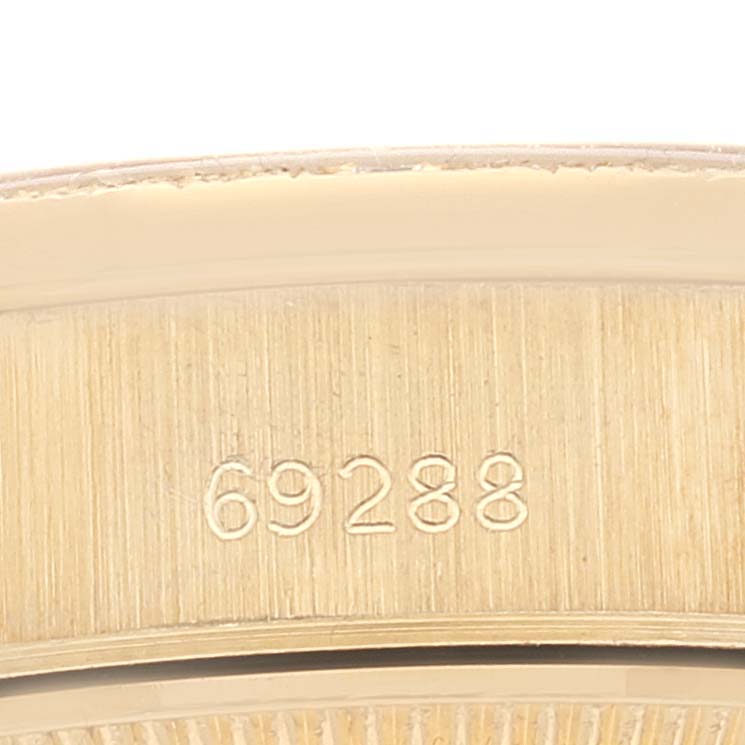 This image shows a close-up of the model number "69288" engraved on the Rolex President 69288 Women's Yellow Gold Beige Dial 69288 Women's Yellow Gold Beige Dial watch.