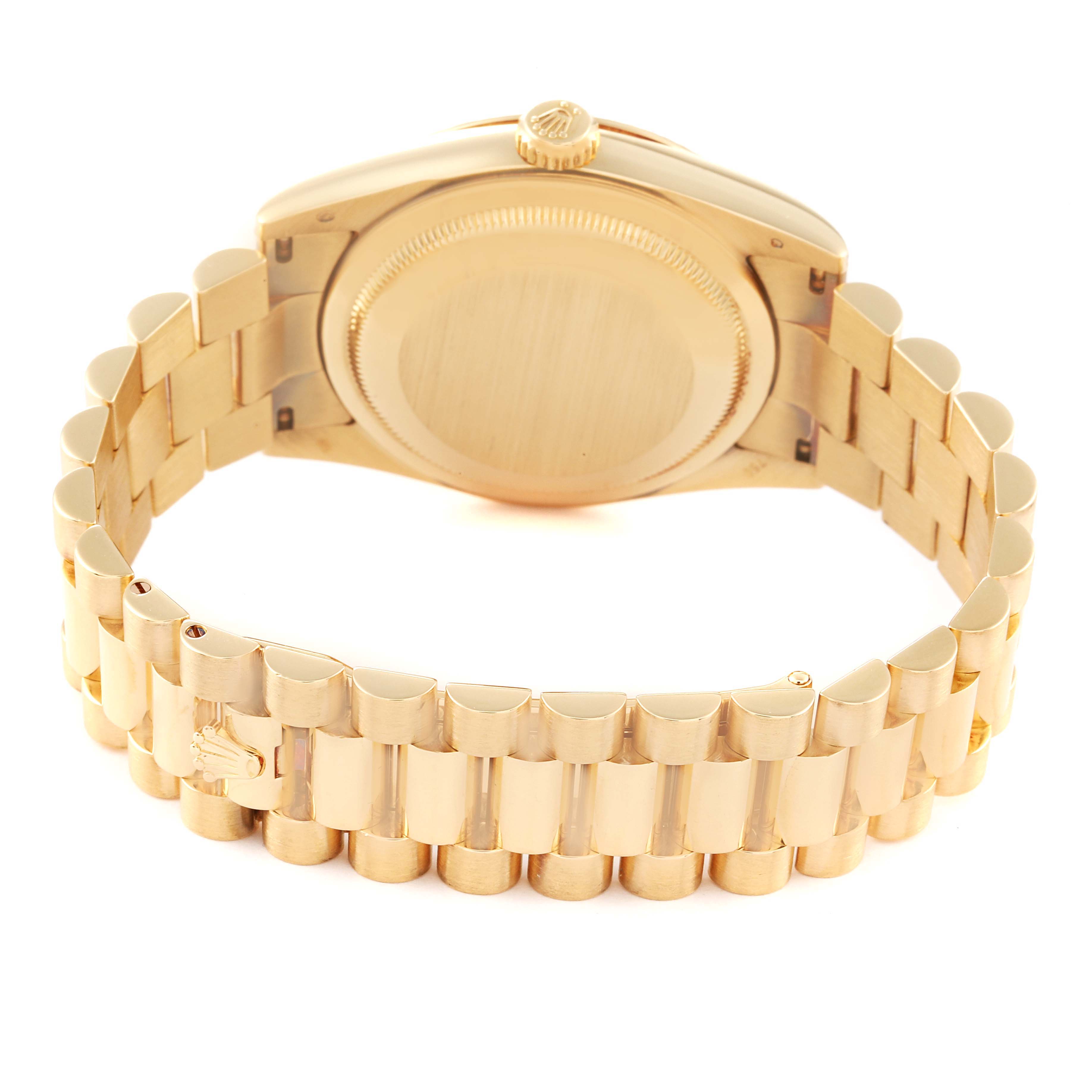 This image shows the back view of a Rolex President 118338 Men
s Yellow Gold  118338 Men
s Yellow Gold  model watch, highlighting the case back and bracelet.