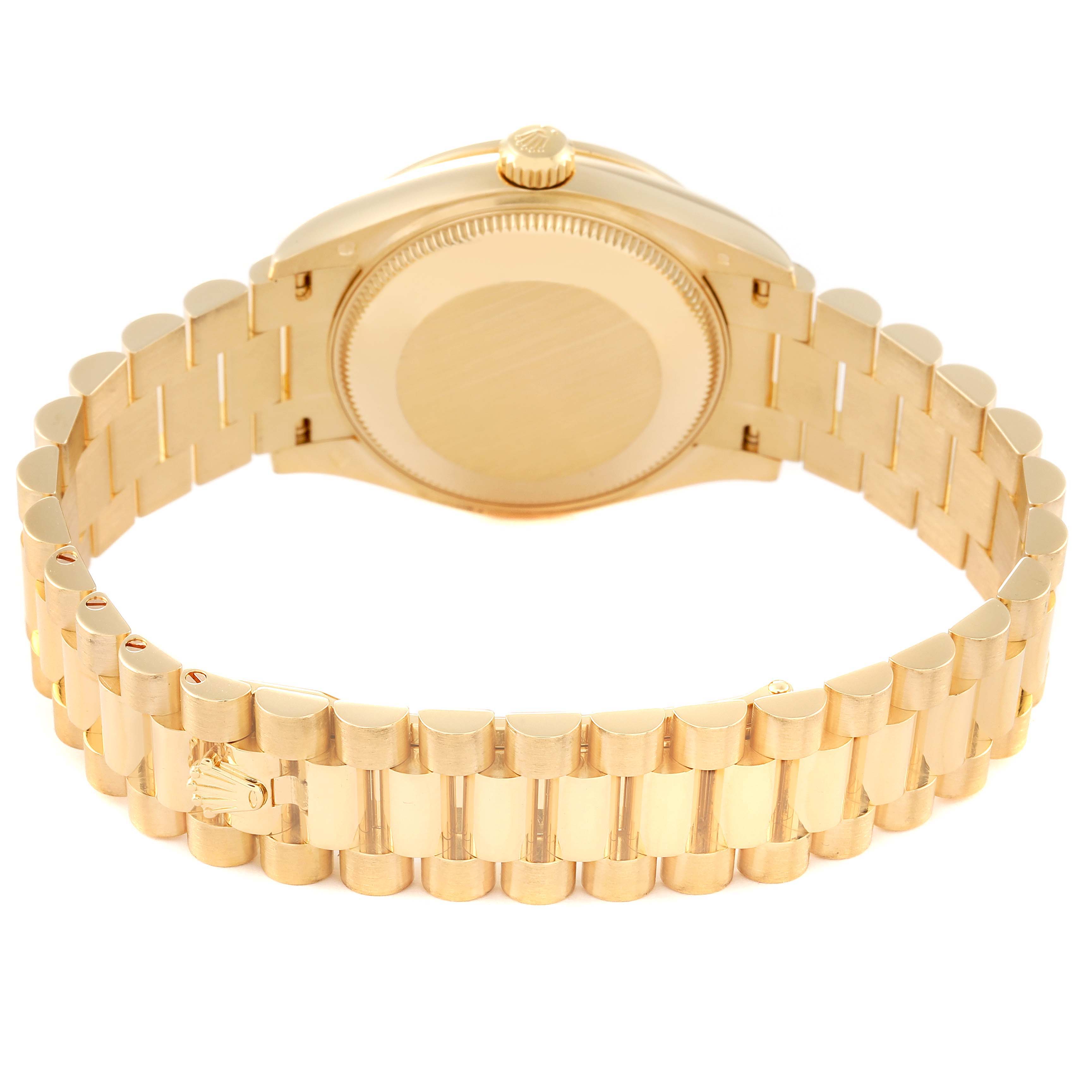 This image shows the backside of a Rolex President 278288 Women's Yellow Gold Mother of Pearl Dial 278288 Women's Yellow Gold Mother of Pearl Dial model watch, highlighting the case back and bracelet.