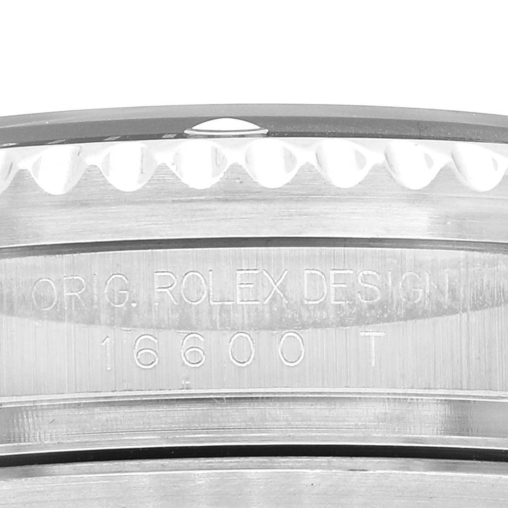 This image shows a close-up of the case side and reference number 16600T engraving on a Rolex Sea-Dweller 16600 Men
s Stainless Steel Black Dial 16600 Men
s Stainless Steel Black Dial watch.