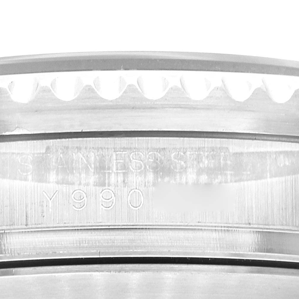 The image shows a close-up of the stainless steel case back of a Rolex Sea-Dweller 16600 Men
s Stainless Steel Black Dial 16600 Men
s Stainless Steel Black Dial watch, focusing on the engraved details.