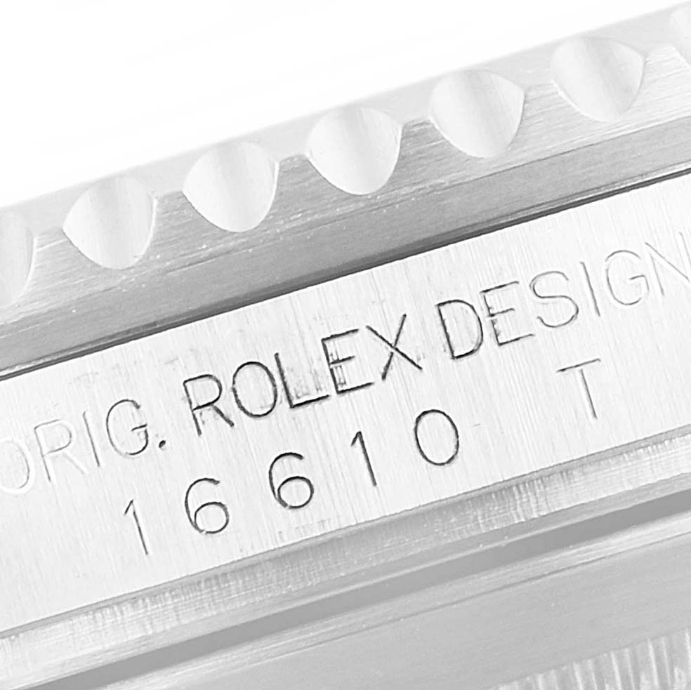 The image shows a close-up of the case with inscriptions for a Rolex Submariner 16610 Men's Stainless Steel Black Dial 16610 Men's Stainless Steel Black Dial 16610 watch, highlighting the model number.