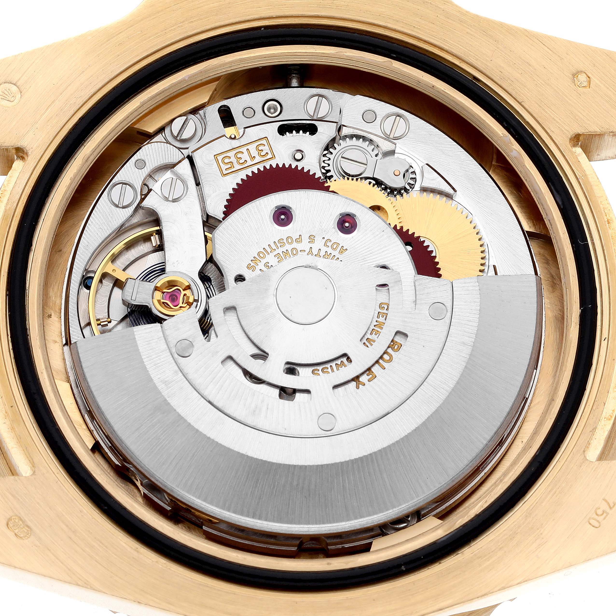 The image shows the back view of a Rolex Submariner 116618 Men's Yellow Gold Black Dial 116618 Men's Yellow Gold Black Dial, revealing the intricate movement and rotor mechanism.