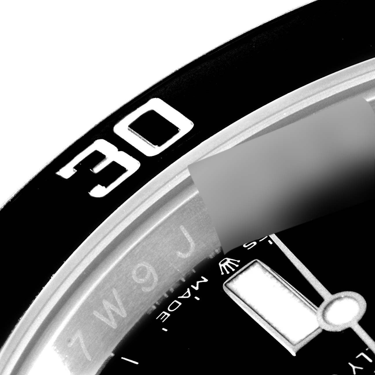 This image shows a close-up of the bezel, dial, and part of the hands of a Rolex Submariner 126610 Men
s Stainless Steel Black Dial 126610 Men
s Stainless Steel Black Dial watch.