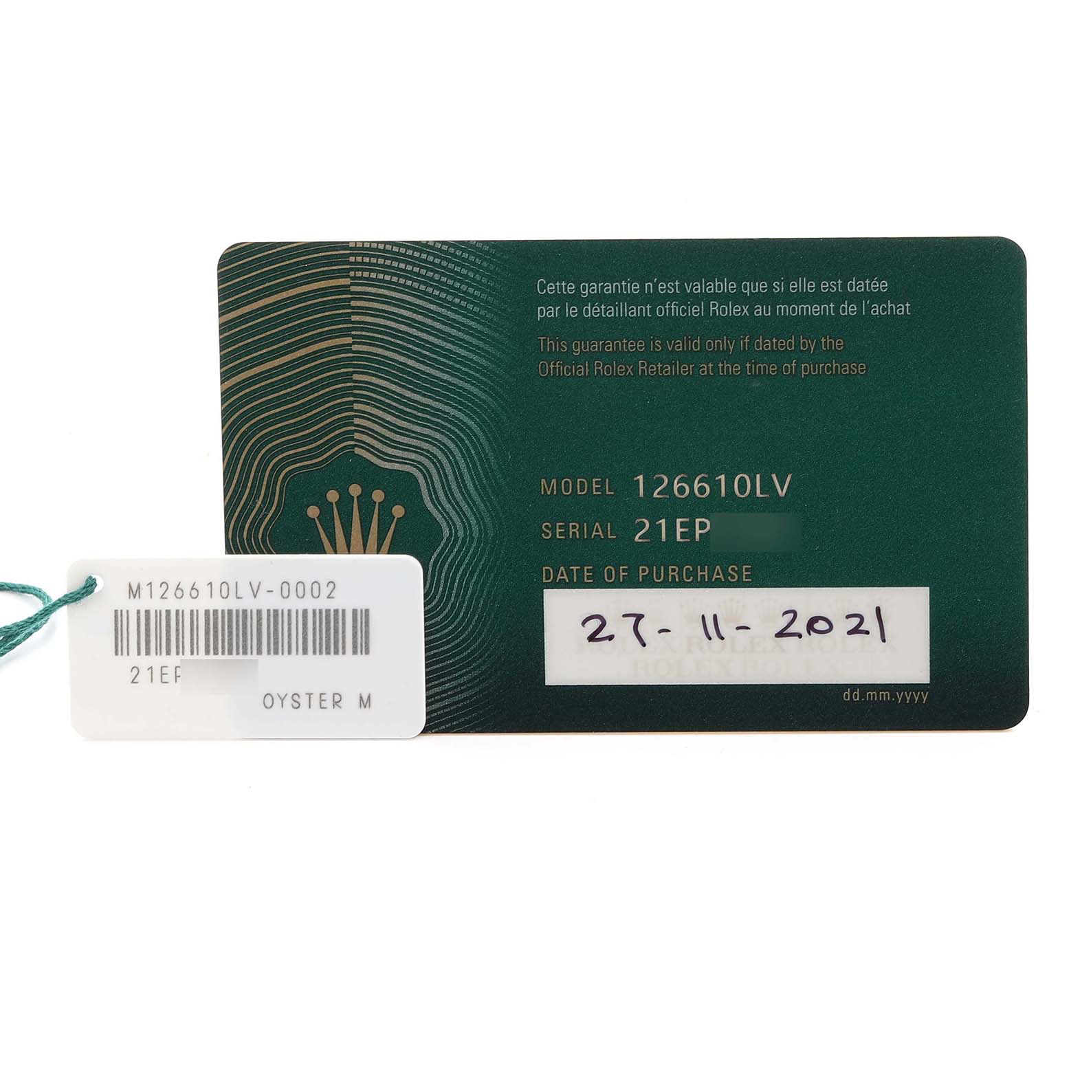 The image shows a Rolex Submariner 126610LV Men's Stainless Steel Black Dial 126610LV Men's Stainless Steel Black Dial model 126610LV warranty card and tag.