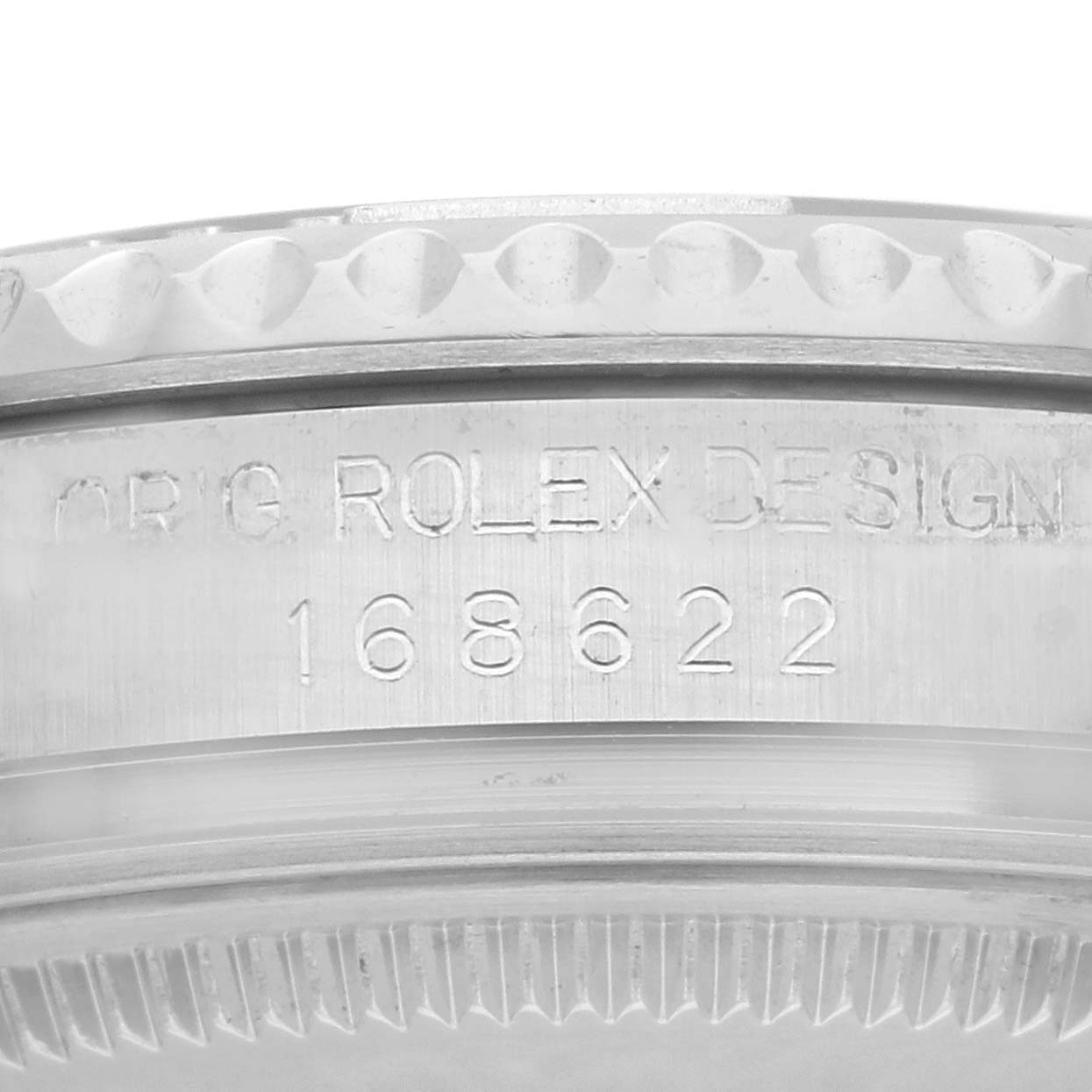 The image shows a close-up of the side of a Rolex Yacht-Master 168622 Men's Stainless Steel Grey Dial 168622 Men's Stainless Steel Grey Dial watch with engraving details.