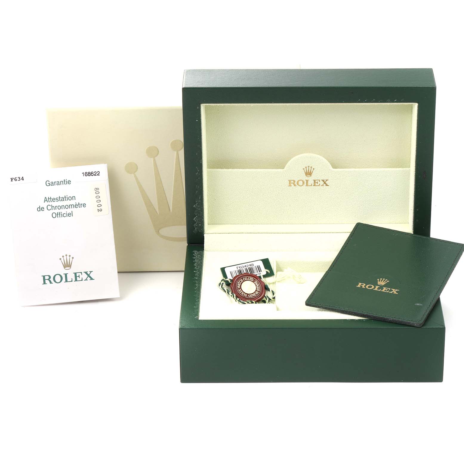 This image shows the packaging, warranty card, booklet, and tag for a Rolex Yacht-Master 168622 Men
s Stainless Steel Silver Dial 168622 Men
s Stainless Steel Silver Dial model.
