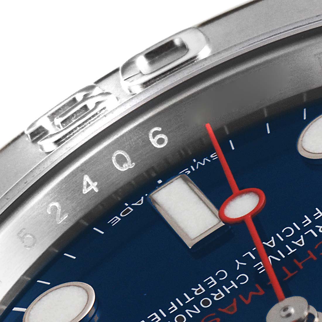 This close-up image of a Rolex Yacht-Master 116622 Men
s Stainless Steel Blue Dial 116622 Men
s Stainless Steel Blue Dial watch shows a portion of the bezel, dial, and part of the bracelet.