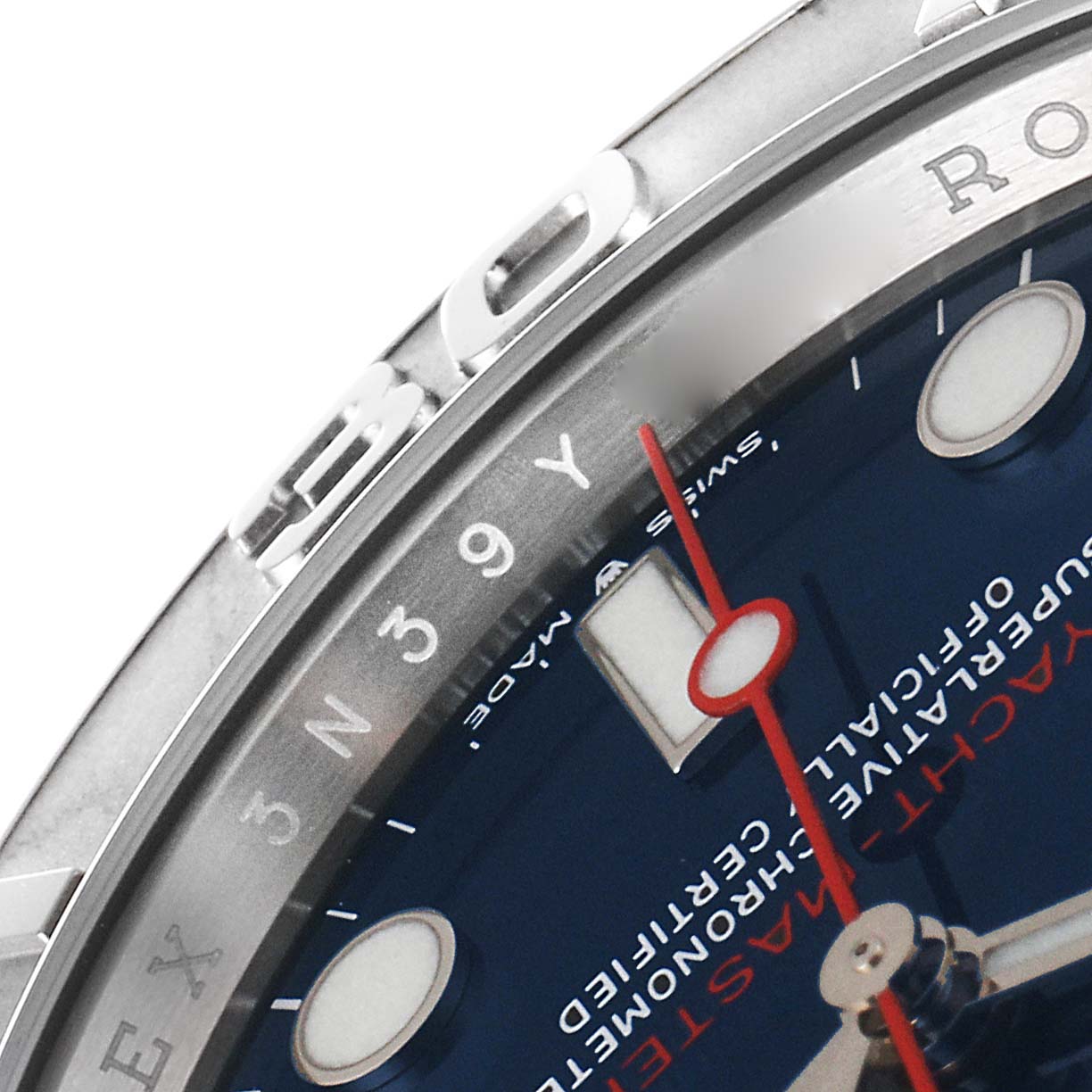 This close-up image shows the bezel, part of the dial, and the tip of the second hand of a Rolex Yacht-Master 126622 Men
s Stainless Steel Blue Dial 126622 Men
s Stainless Steel Blue Dial watch.