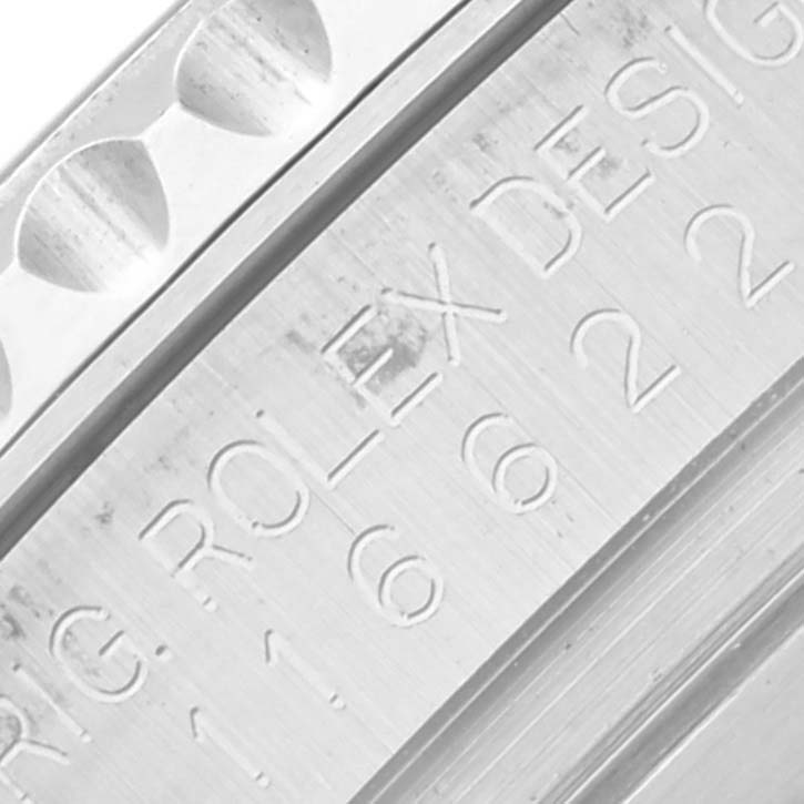 The image shows a close-up of the side engraving on a Rolex Yacht-Master 116622 Men's Stainless Steel Blue Dial 116622 Men's Stainless Steel Blue Dial watch, highlighting the brand name.