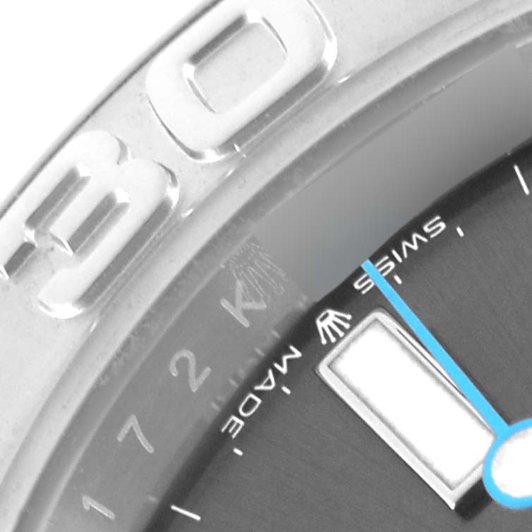 The image shows a close-up of the Rolex Yacht-Master 126622 Men's Stainless Steel Grey Dial 126622 Men's Stainless Steel Grey Dial bezel and part of the dial with text detailing.