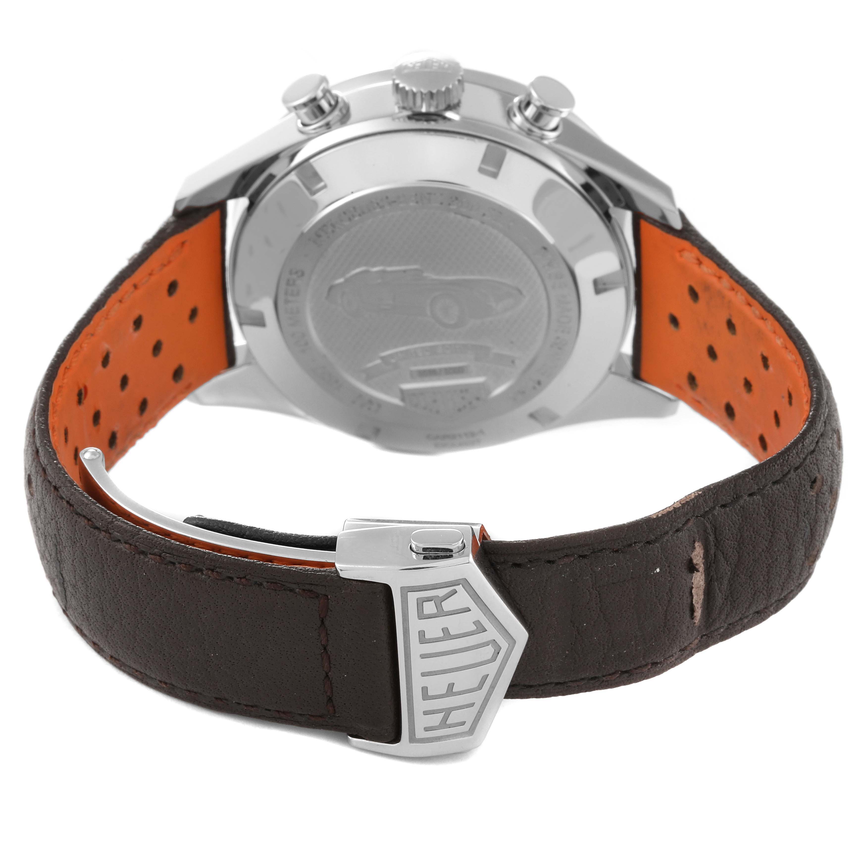 The image shows the back view of a Tag Heuer Carrera CAR2112.FC6267 Men's Stainless Steel Brown Dial CAR2112.FC6267 Men's Stainless Steel Brown Dial watch, highlighting the case back and leather strap with a visible "Heuer" clasp.