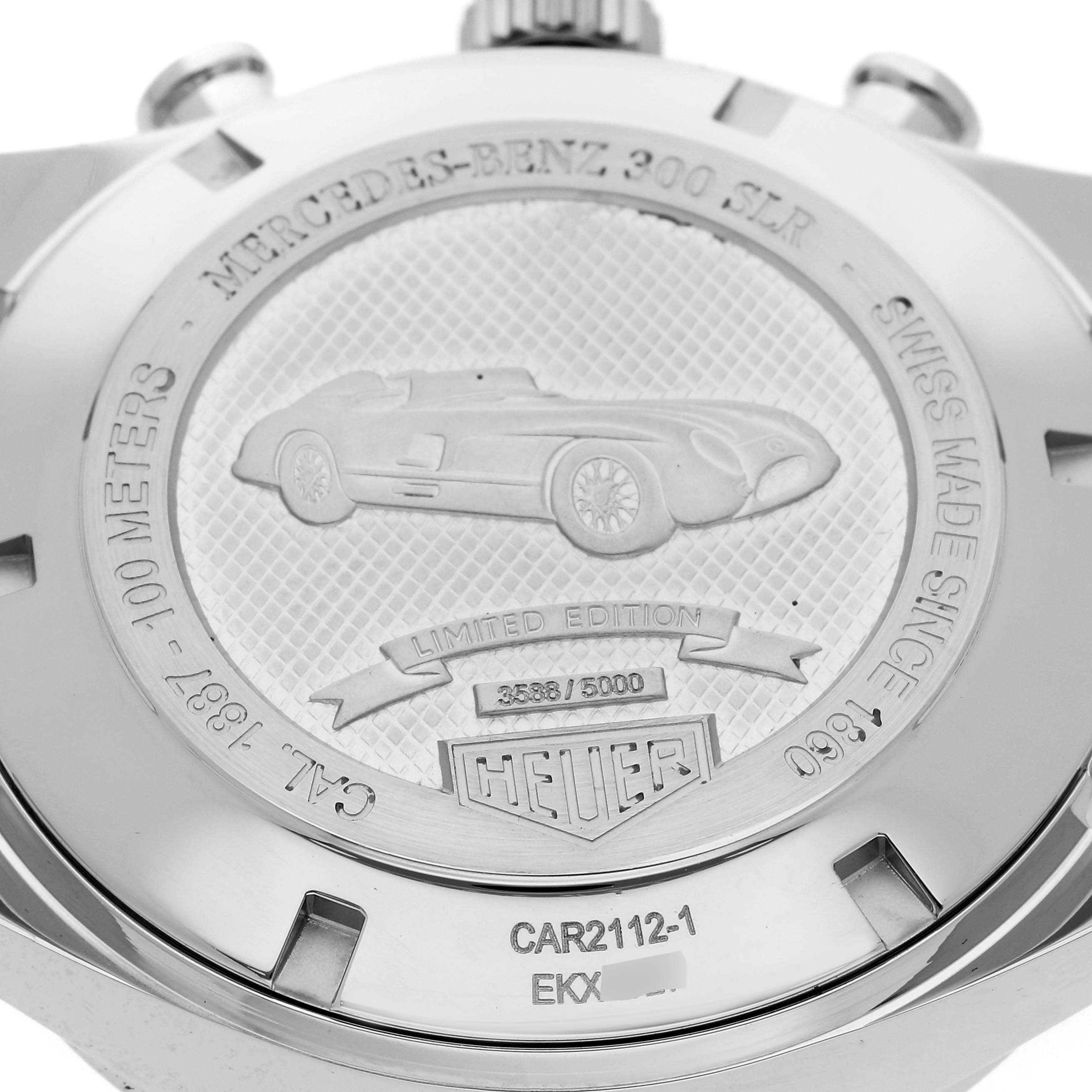 The image shows the back of a Tag Heuer Carrera CAR2112.FC6267 Men's Stainless Steel Brown Dial CAR2112.FC6267 Men's Stainless Steel Brown Dial watch, specifically featuring its engraved caseback and limited edition markings.