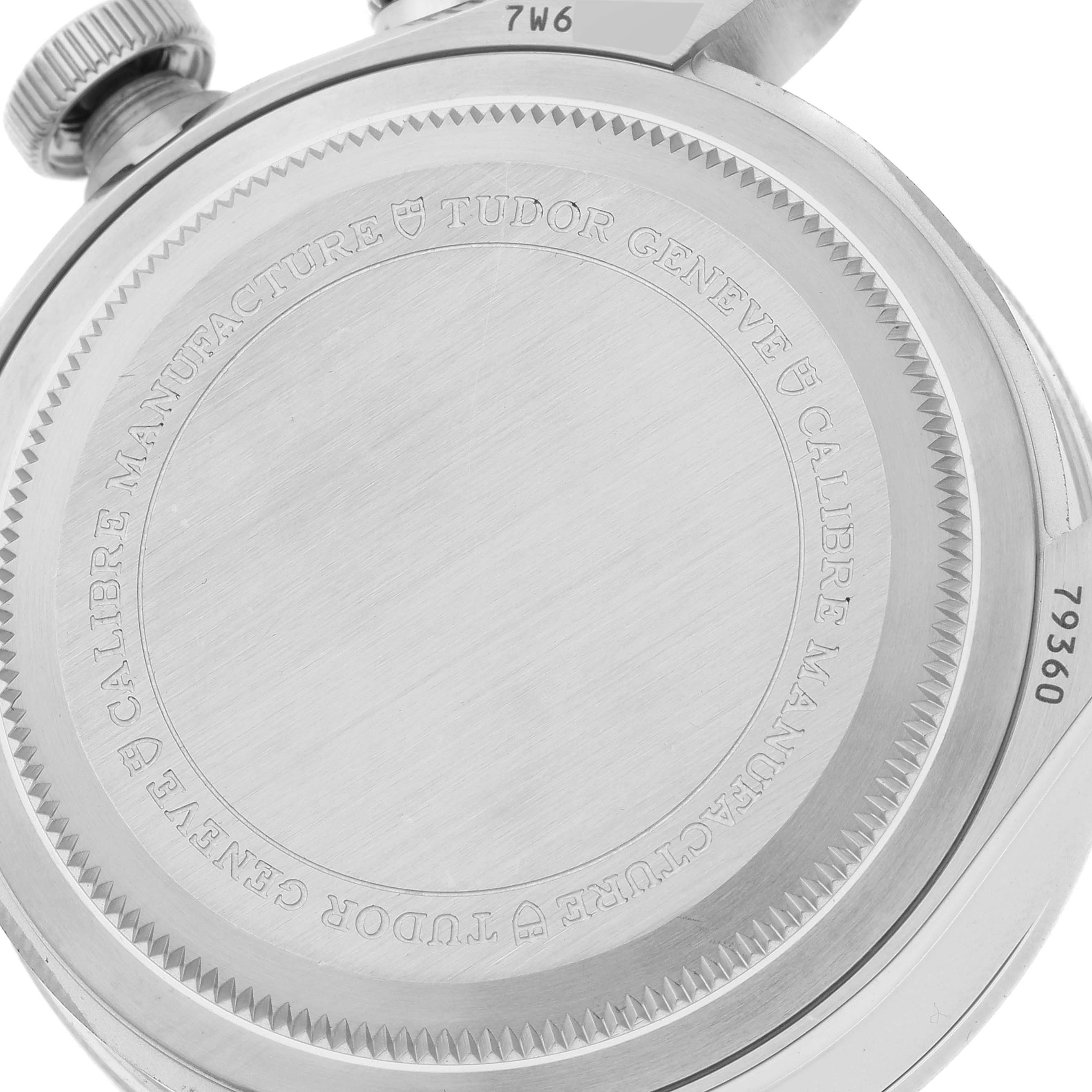 This image shows the case back of the Tudor Heritage Black Bay M79360N-0002 Men's Stainless Steel Silver Dial M79360N-0002 Men's Stainless Steel Silver Dial watch, highlighting the engravings and crown.