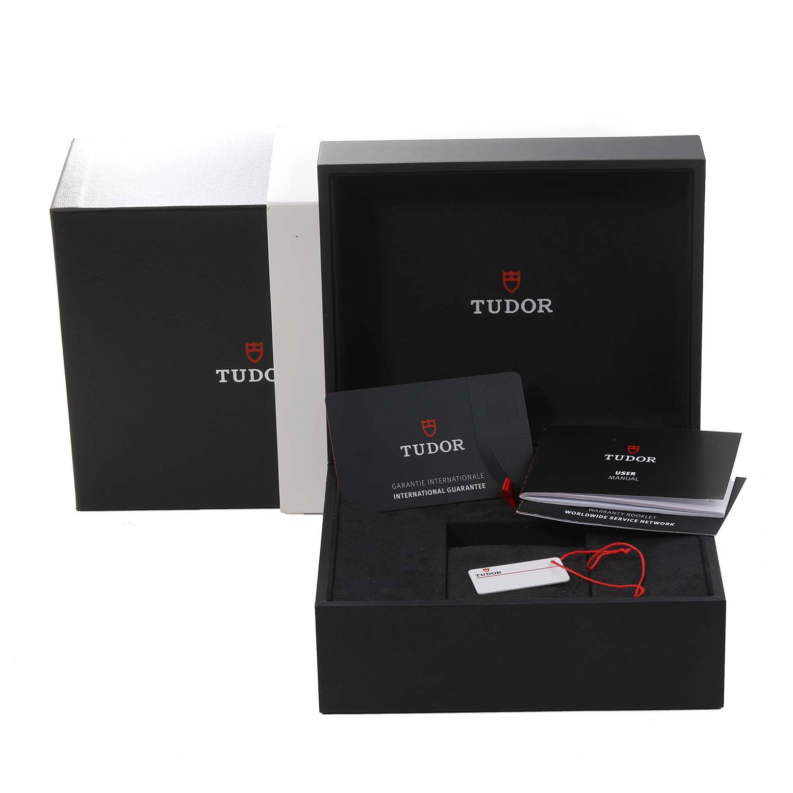 The image shows the open packaging for a Tudor Heritage Black Bay M79360N-0002 Men's Stainless Steel Silver Dial M79360N-0002 Men's Stainless Steel Silver Dial watch, including the watch box, warranty cards, and booklets.