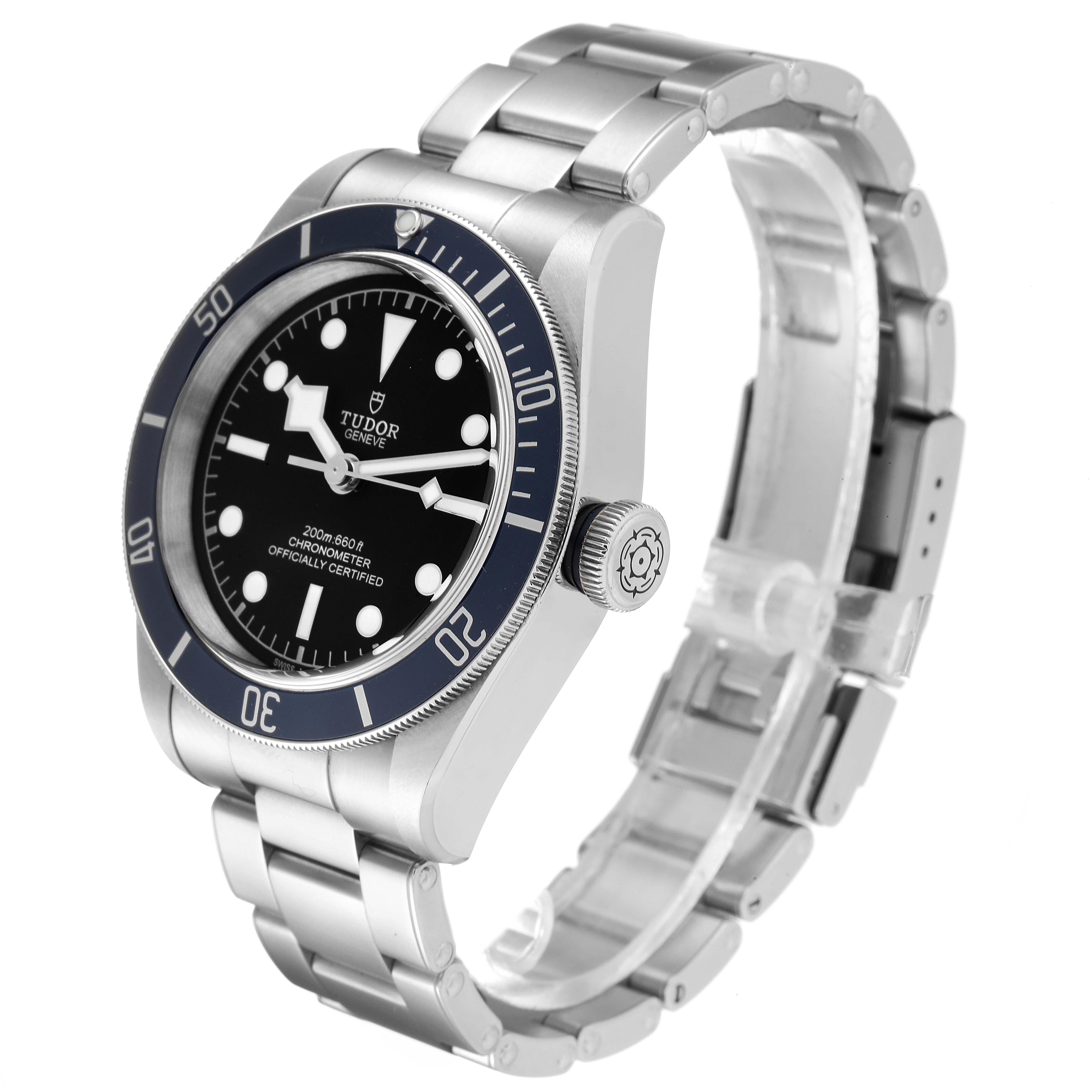 The image shows a Tudor Heritage Black Bay 79230B Men
s Stainless Steel Black Dial 79230B Men
s Stainless Steel Black Dial watch at a three-quarter angle, displaying its face, bezel, crown, and metal bracelet.