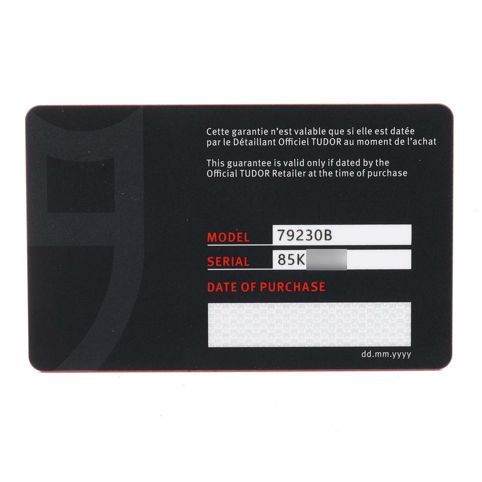 This image shows the warranty card for a Tudor Heritage Black Bay 79230B Men
s Stainless Steel Black Dial 79230B Men
s Stainless Steel Black Dial model watch, including the model number 79230B and a serial number.