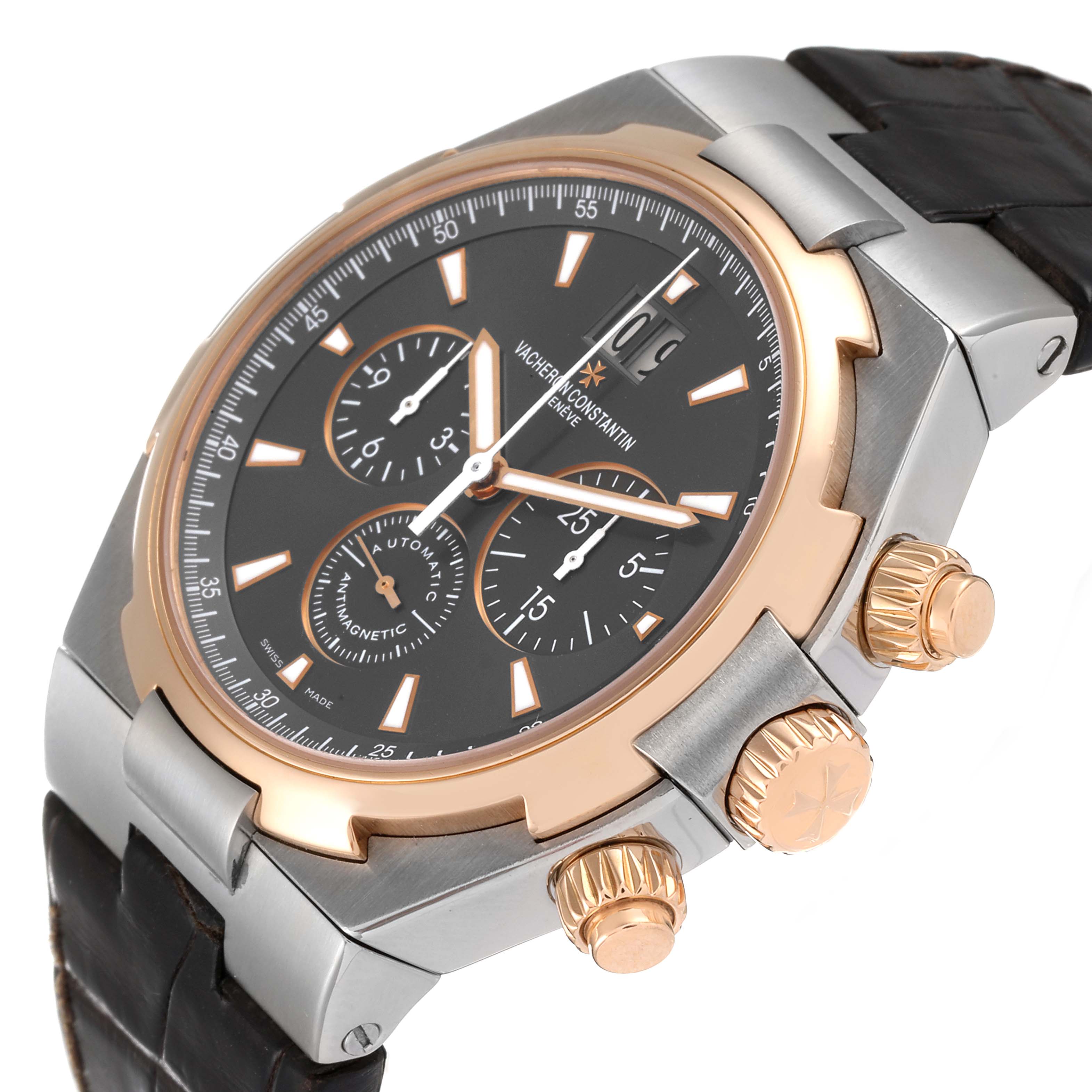 The image shows a Vacheron Constantin Overseas 49150/000M-9338 Men's Steel and Gold (two tone) Grey Dial 49150/000M-9338 Men's Steel and Gold (two tone) Grey Dial model watch at an angled view, highlighting the dial, case, crown, and pushers.