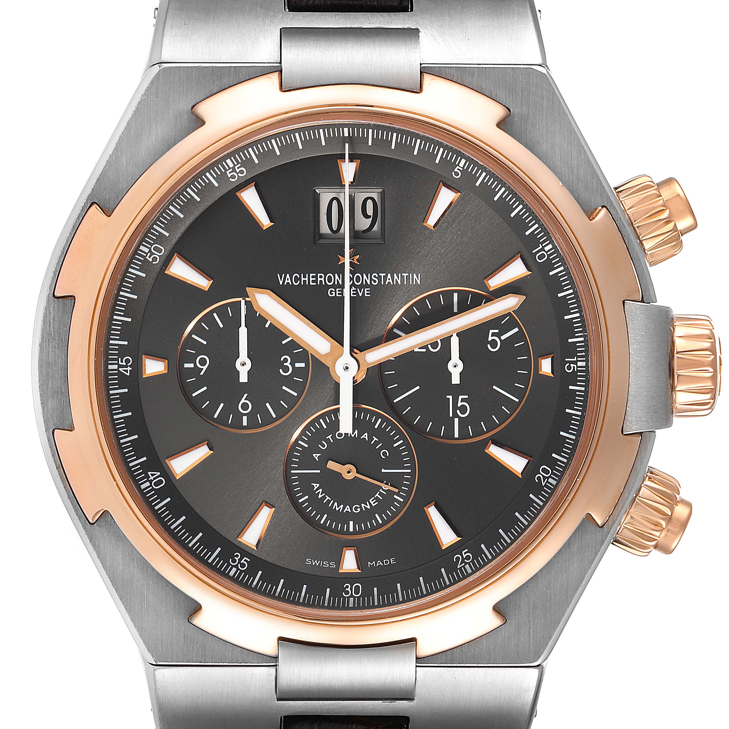 The image shows a front view of a Vacheron Constantin Overseas 49150/000M-9338 Men's Steel and Gold (two tone) Grey Dial 49150/000M-9338 Men's Steel and Gold (two tone) Grey Dial model watch, highlighting its dial, subdials, and crown.