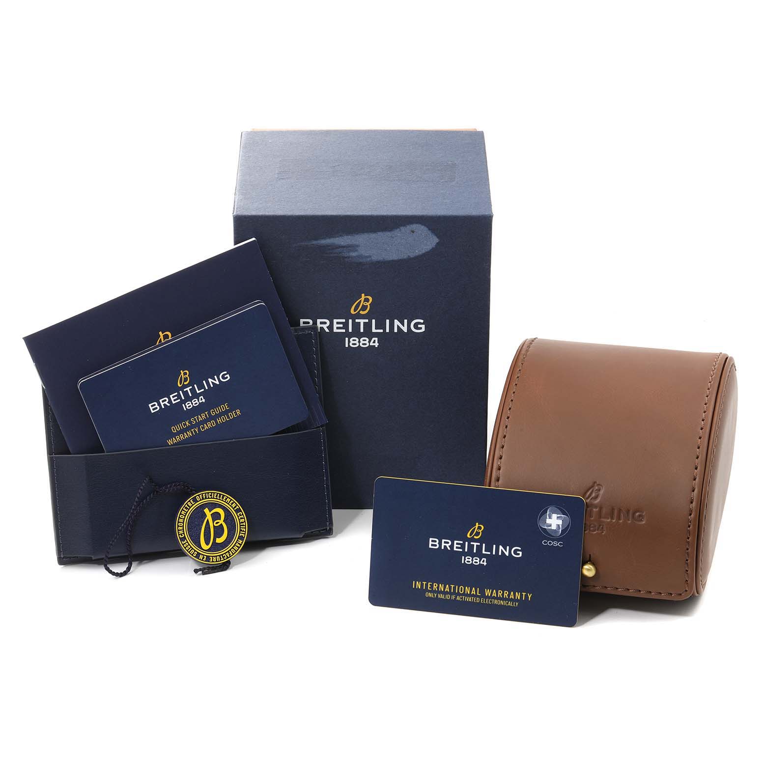 The image shows the packaging and accessories for the Breitling Superocean AB2010 Men's Stainless Steel Black Dial AB2010 Men's Stainless Steel Black Dial watch, including the box, leather case, warranty card, and manual.