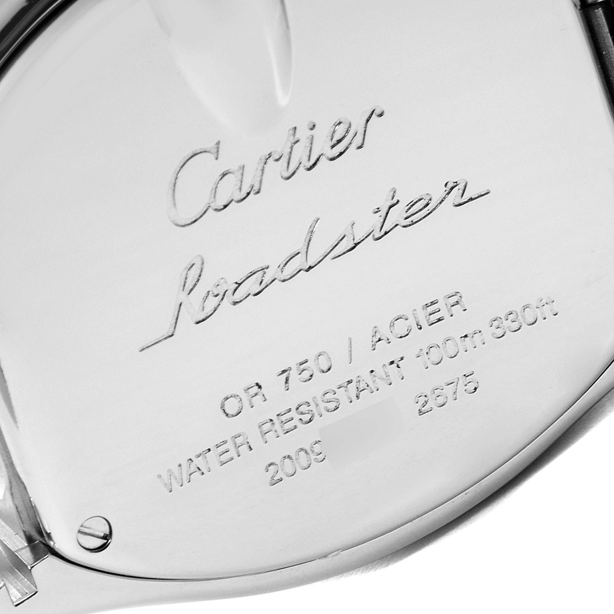 This image shows the back of a Cartier Roadster W62026Y4 Women
s Steel and Gold (two tone) Silver Dial W62026Y4 Women
s Steel and Gold (two tone) Silver Dial watch, highlighting its engravings and details.