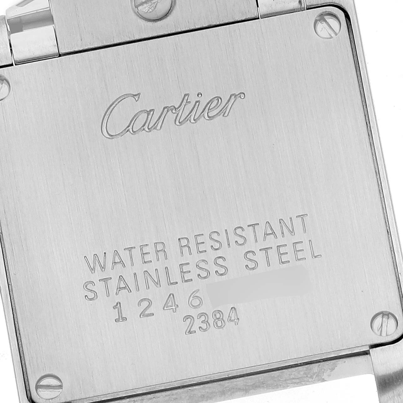 The image shows the back panel of a Cartier Tank Francaise W51008Q3 Women
s Stainless Steel Silver Dial W51008Q3 Women
s Stainless Steel Silver Dial watch, highlighting its water resistance and stainless steel material.