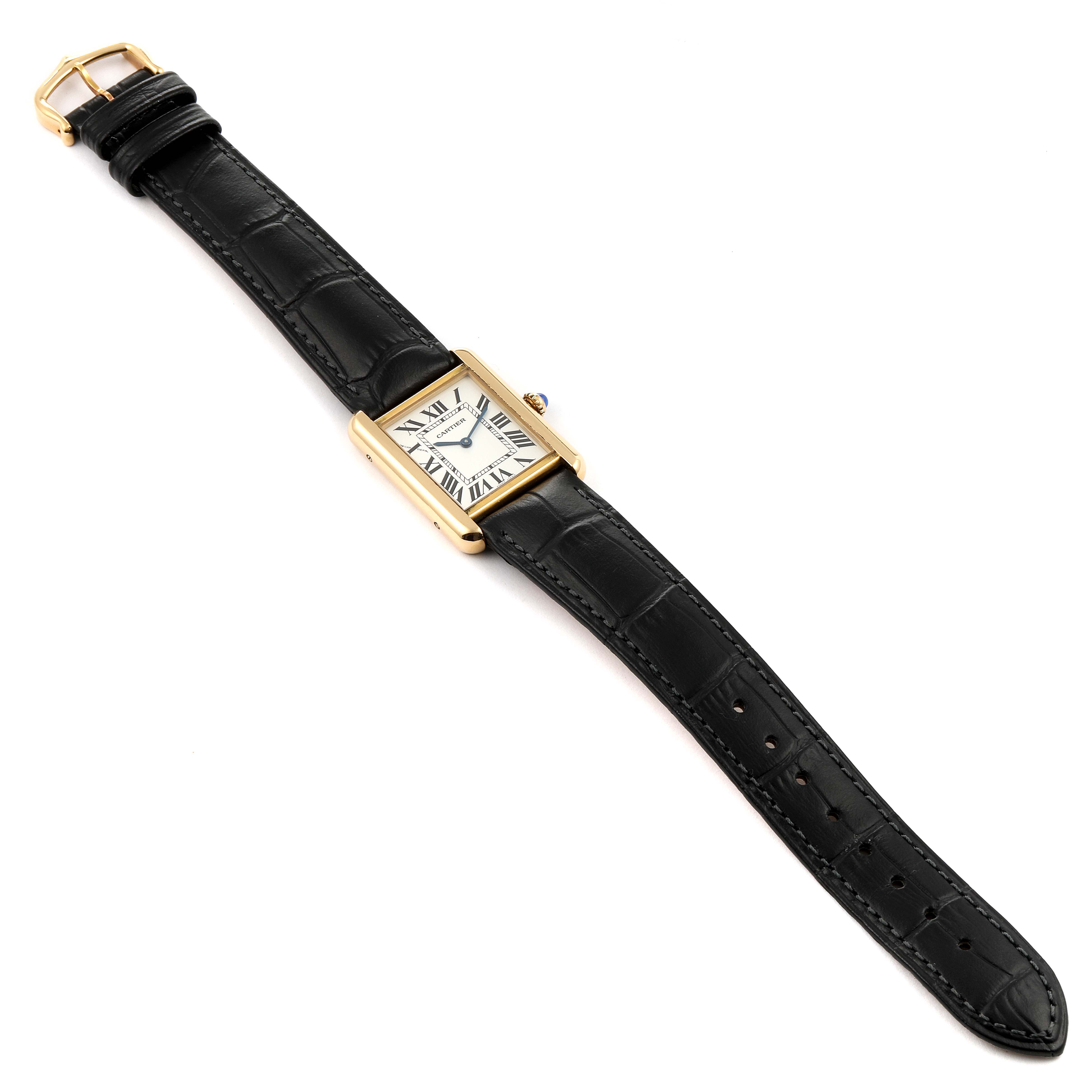 This image shows a Cartier Tank Solo 290730PL Women
s Yellow Gold Silver Dial 290730PL Women
s Yellow Gold Silver Dial watch with a rectangular face and a black leather strap, viewed from above.