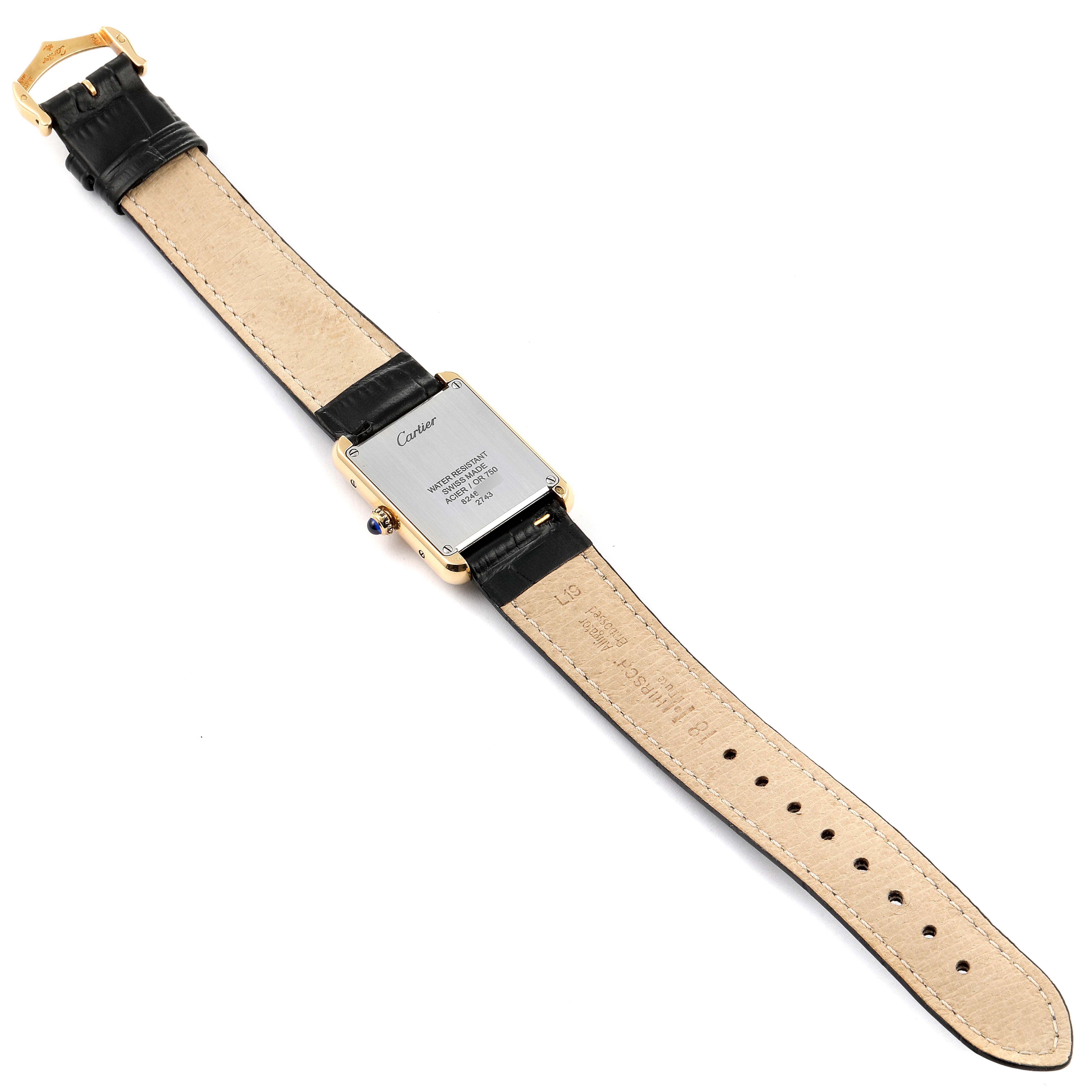 The image shows the back view of a Cartier Tank Solo 290730PL Women
s Yellow Gold Silver Dial 290730PL Women
s Yellow Gold Silver Dial watch, highlighting the case back and leather strap.