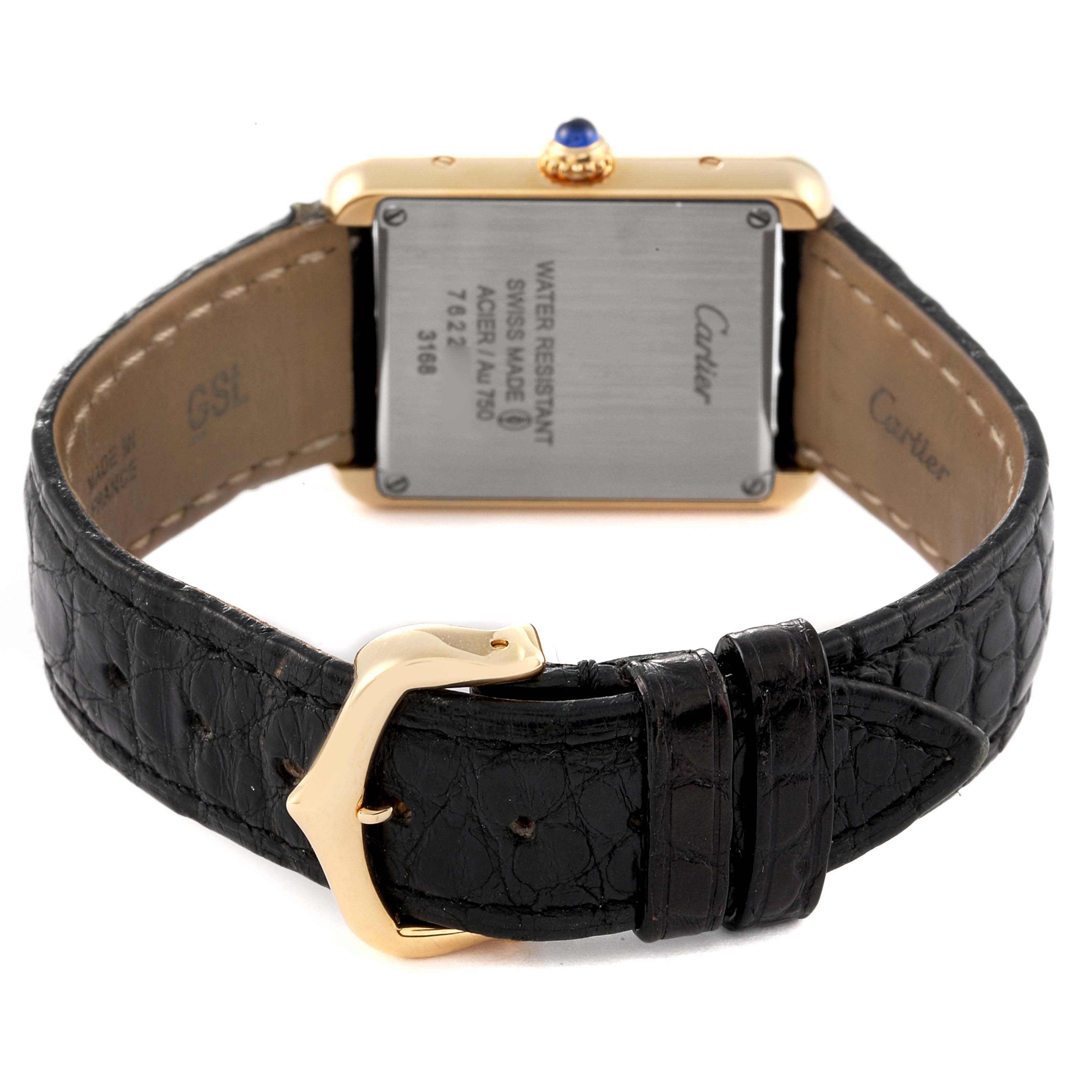 The image shows the back view of a Cartier Tank Solo W5200002 Women's Yellow Gold Silver Dial W5200002 Women's Yellow Gold Silver Dial watch, displaying the case back, strap, and clasp.