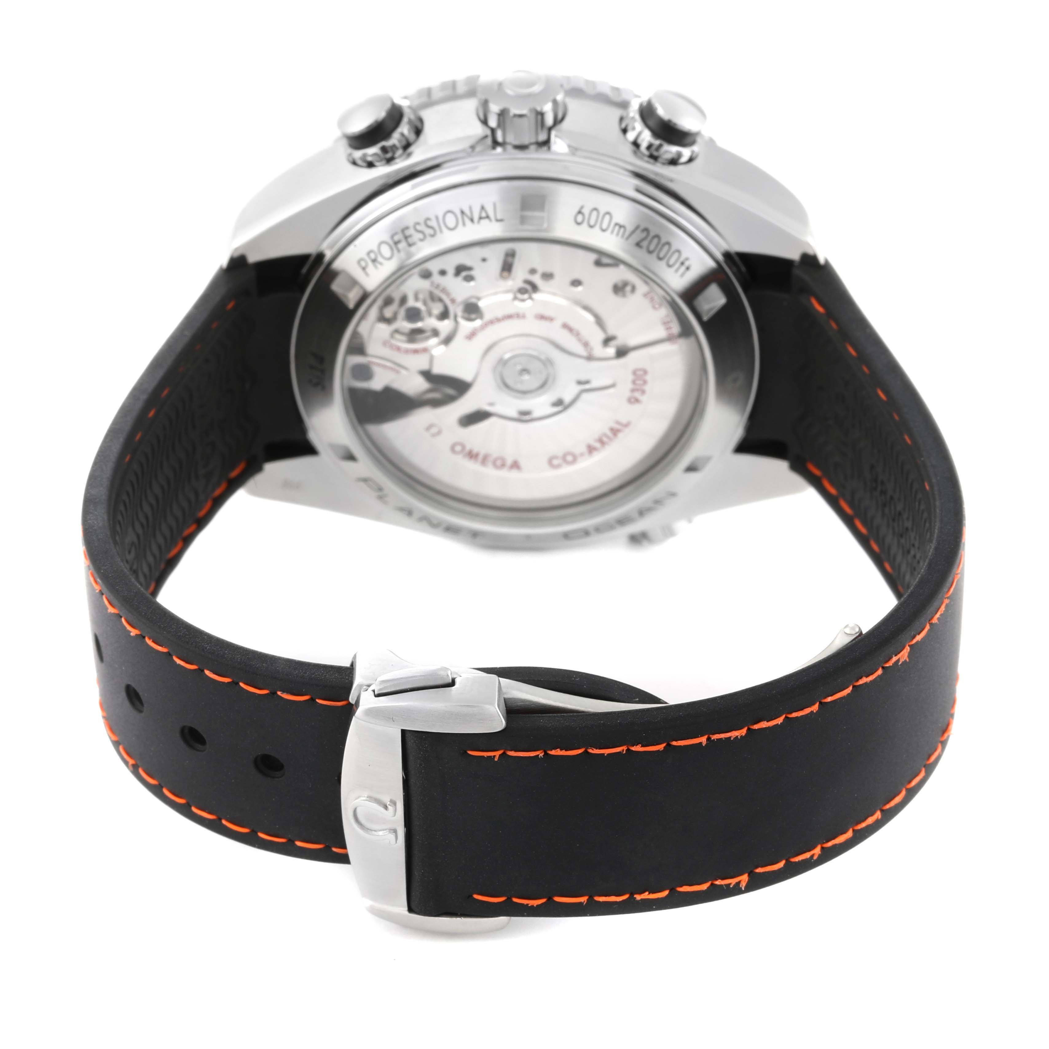 The image shows the back view of the Omega Planet Ocean 232.32.46.51.01.005 Men
s Stainless Steel Black Dial 232.32.46.51.01.005 Men
s Stainless Steel Black Dial watch, highlighting the movement and part of the strap clasp.