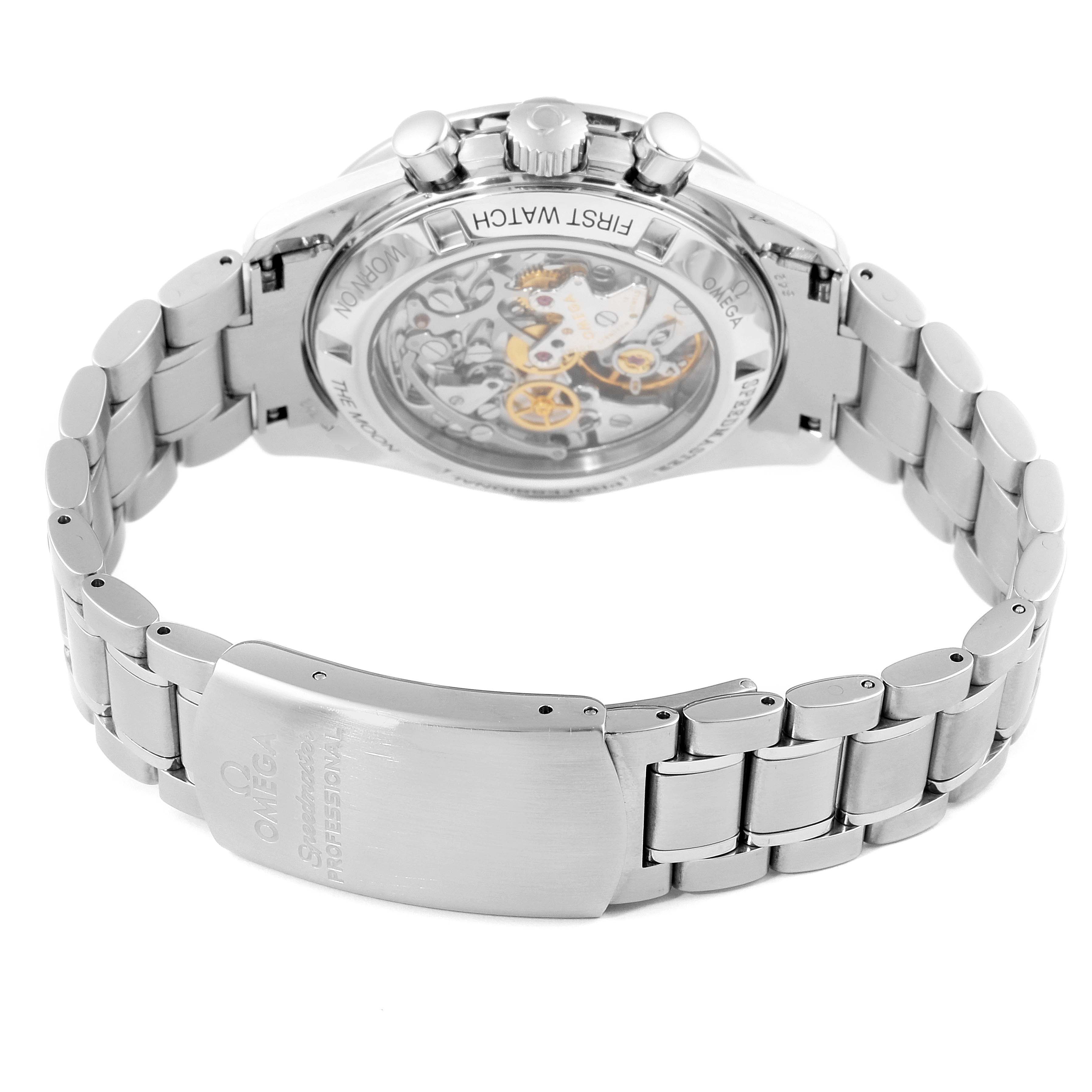 The image shows the back and clasp of an Omega Speedmaster 3572.50.00 Men
s Stainless Steel Black Dial 3572.50.00 Men
s Stainless Steel Black Dial watch, highlighting its transparent case back and metal bracelet.