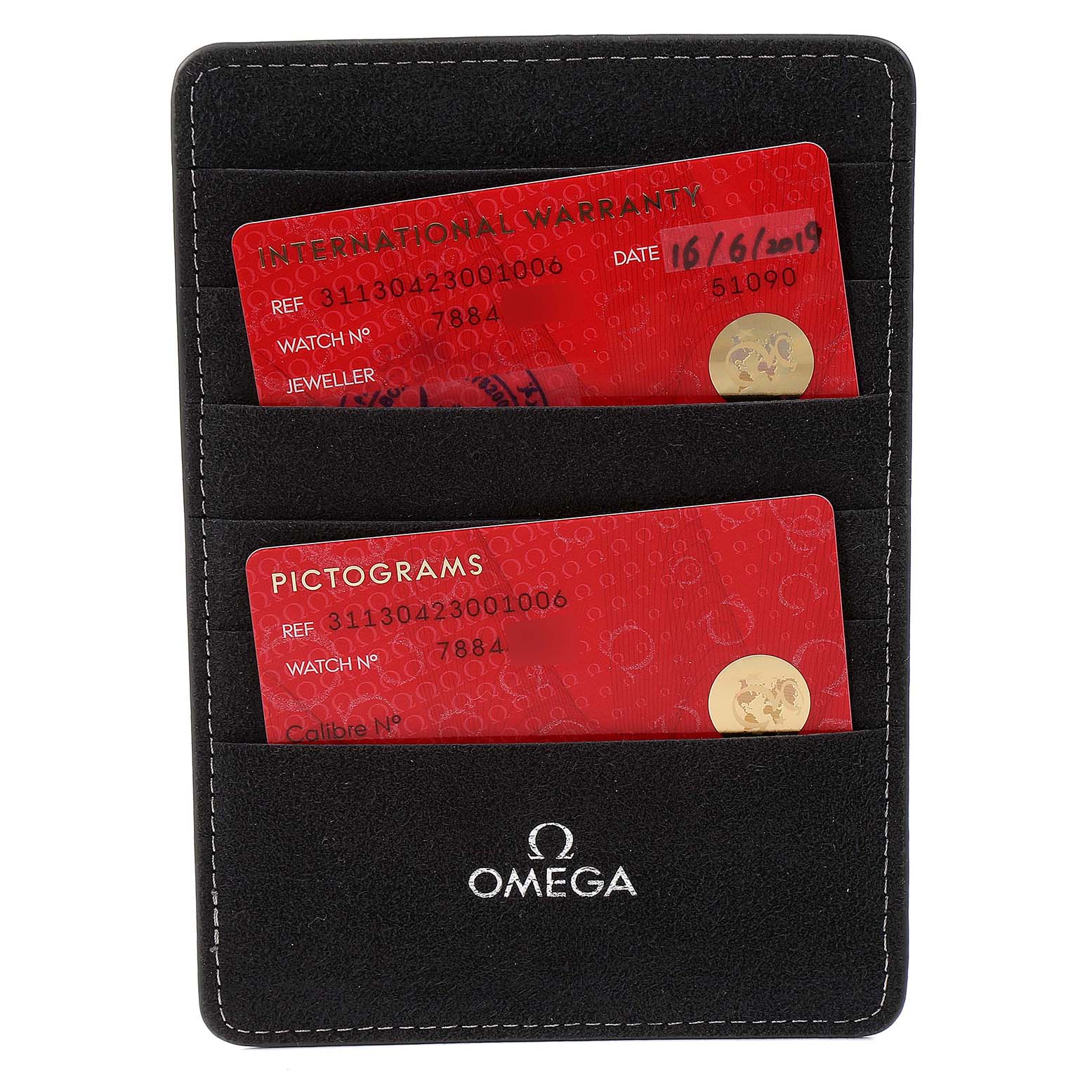 This image shows two warranty and pictogram cards for an Omega Speedmaster 311.30.42.30.01.006 Men's Stainless Steel Black Dial 311.30.42.30.01.006 Men's Stainless Steel Black Dial, held in a black cardholder with the Omega logo.