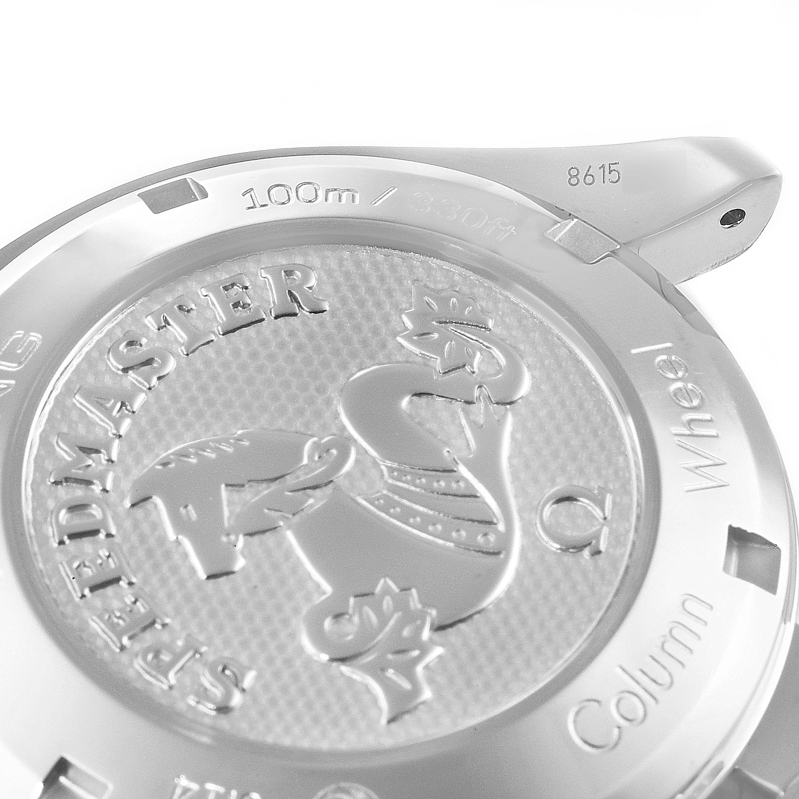 The image shows the case back of an Omega Speedmaster 326.30.40.50.11.001 Men's Stainless Steel Red Dial 326.30.40.50.11.001 Men's Stainless Steel Red Dial watch, highlighting the embossed logo and water resistance information.