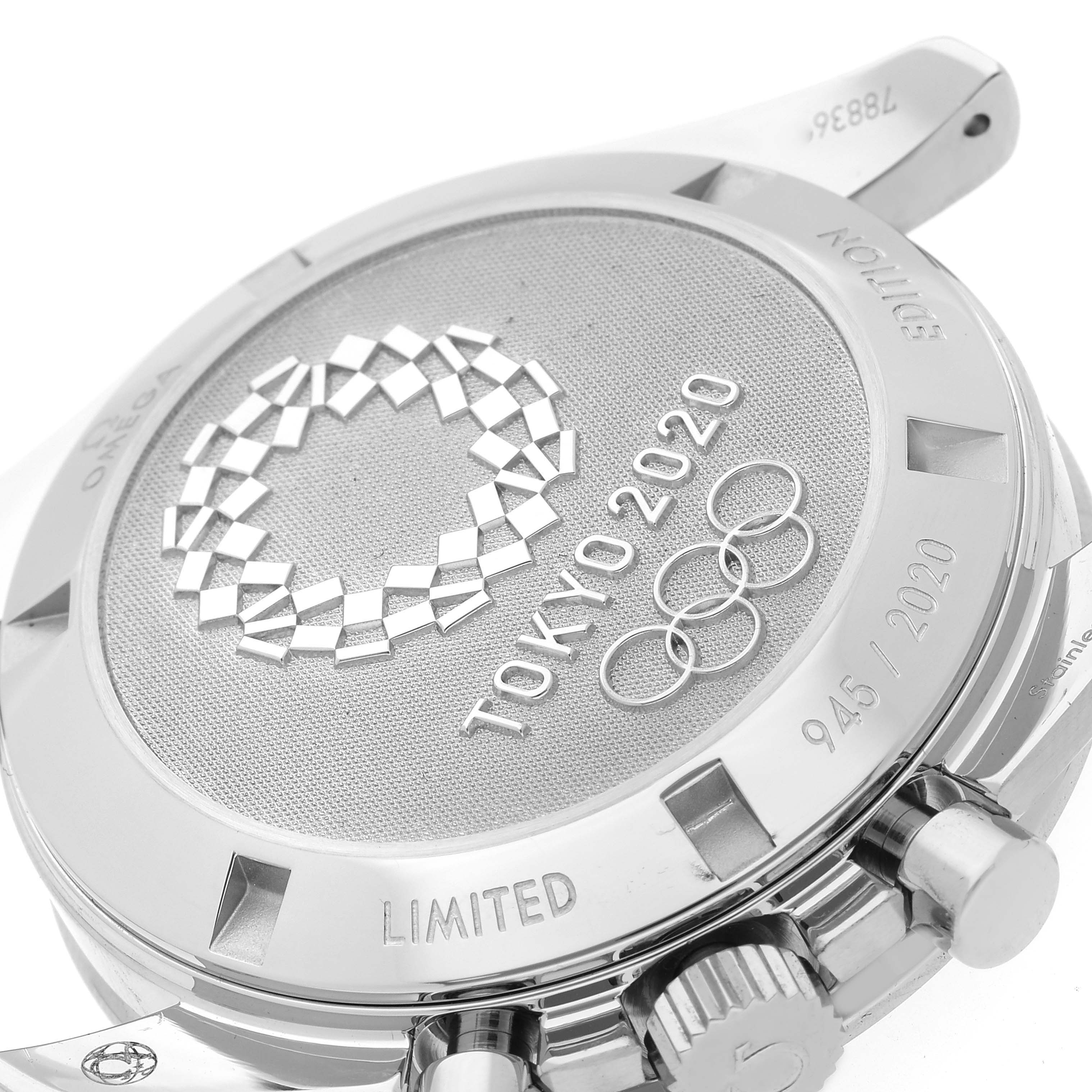 This image shows the back case of an Omega Speedmaster 522.30.42.30.04.001 Men's Stainless Steel White Dial 522.30.42.30.04.001 Men's Stainless Steel White Dial, featuring Tokyo 2020 Olympic engravings.