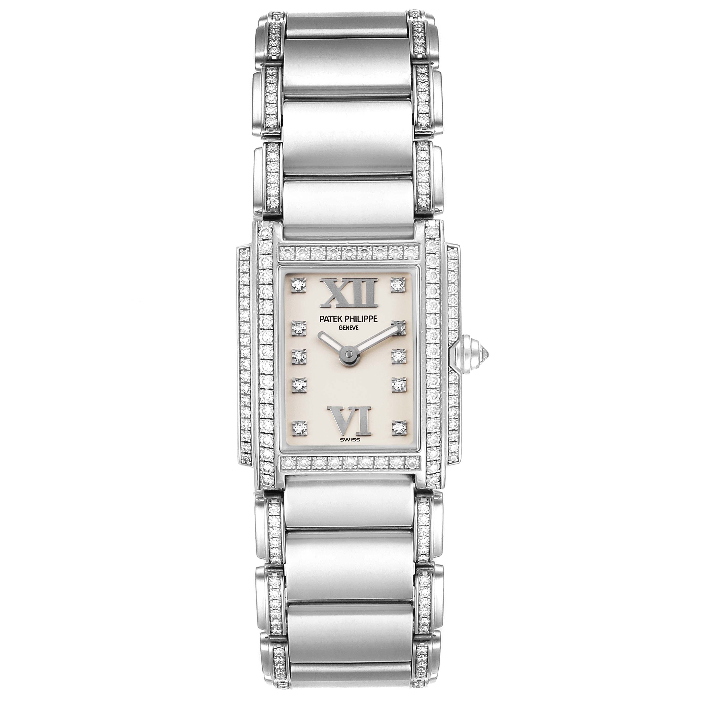 This image shows a front view of the Patek Philippe Twenty-4 4908/310G Women's White Gold Silver Dial 4908/310G Women's White Gold Silver Dial watch, highlighting its rectangular face, diamond accents, and metal bracelet.